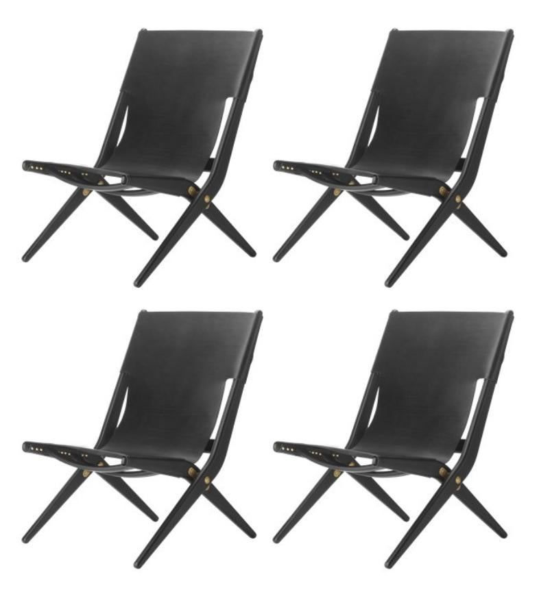 Set of 4 black stained oak and black laeather Saxe chairs by Lassen
Dimensions: W 60 x D 67 x H 84 cm 
Materials: leather, oak.

Mogens Lassen was perceived as ‘the naughty boy in class’, but he aimed for perfection in each design project. His