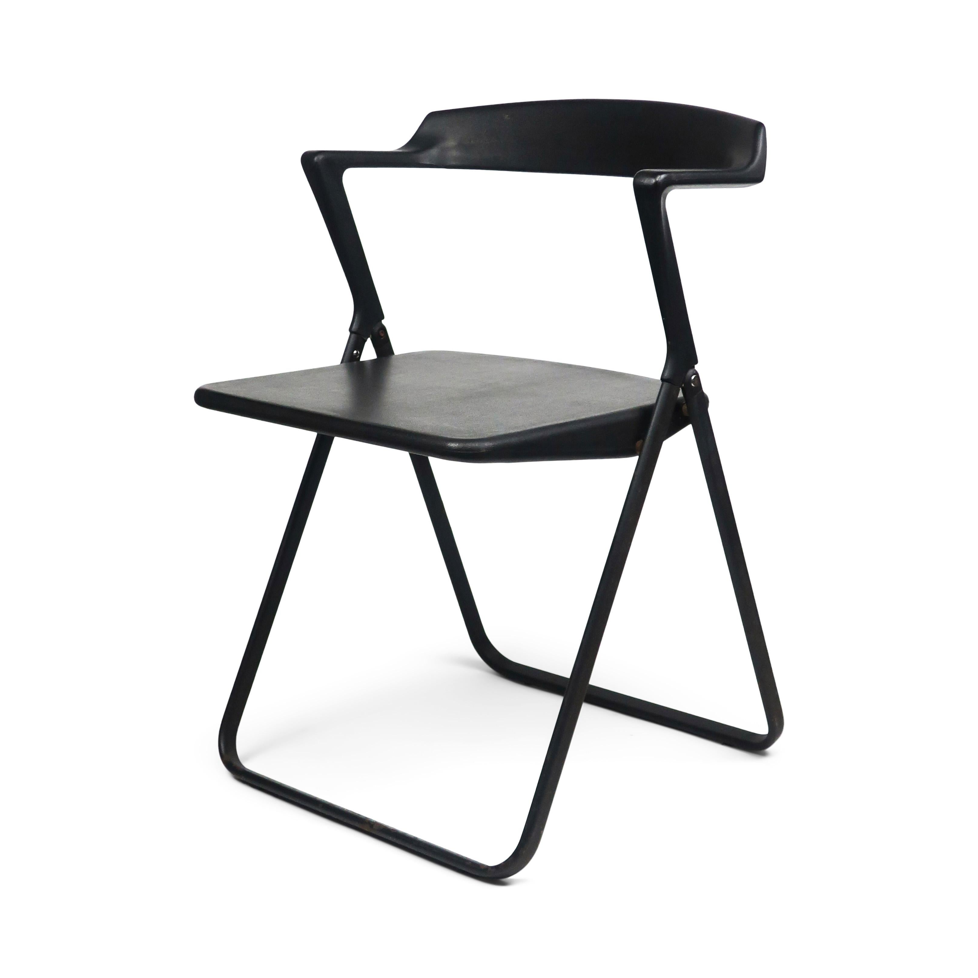 Designed by Motomi Kawakami for Skipper in 1977, the Blitz folding chair epitomizes Postmodern design with a slim yet comfortable chair with a minimal use of material. A set of 4 with black rubber seats, backs and arms and painted steel bases.