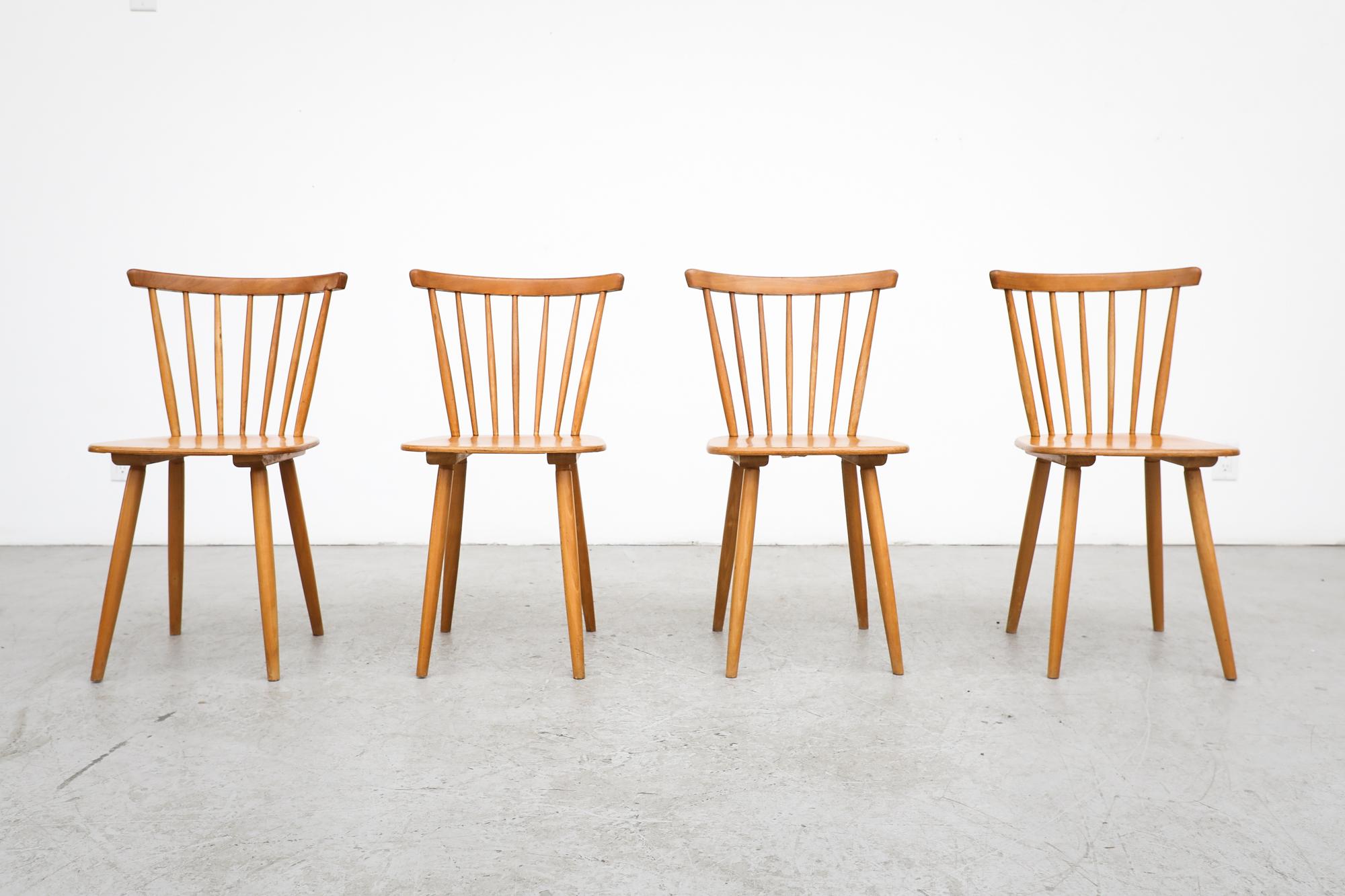 Set of 4 blonde Farstrup spindle back dining chairs. In original condition with normal wear consistent with age and use. Sold as a set.