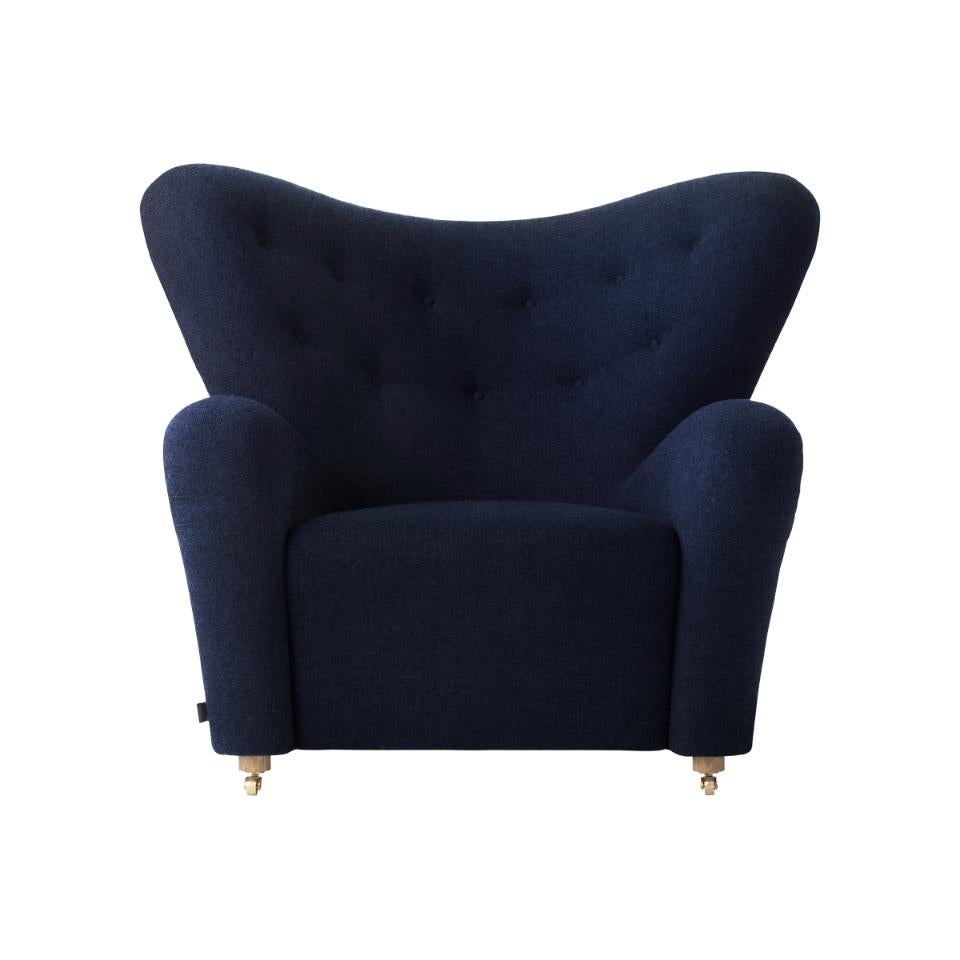 Ensemble de 4 chaises longues bleues Hallingdal the tired man de Lassen
Dimensions : L 102 x P 87 x H 88 cm 
Matériaux : Peau de mouton

Flemming Lassen a conçu le fauteuil rembourré, The Tired Man, pour le concours de la Guild de Copenhague en