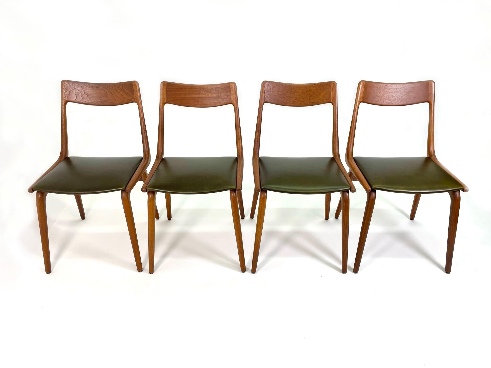 We have just reupholstered and restored this set of 4 vintage Danish Modern chairs designed by Alfred Christensen. Manufacturer for Slagelse Møbelværk.

Thishis set of Scandinavian dining chairs feature a teak frame and the most wonderful delicate