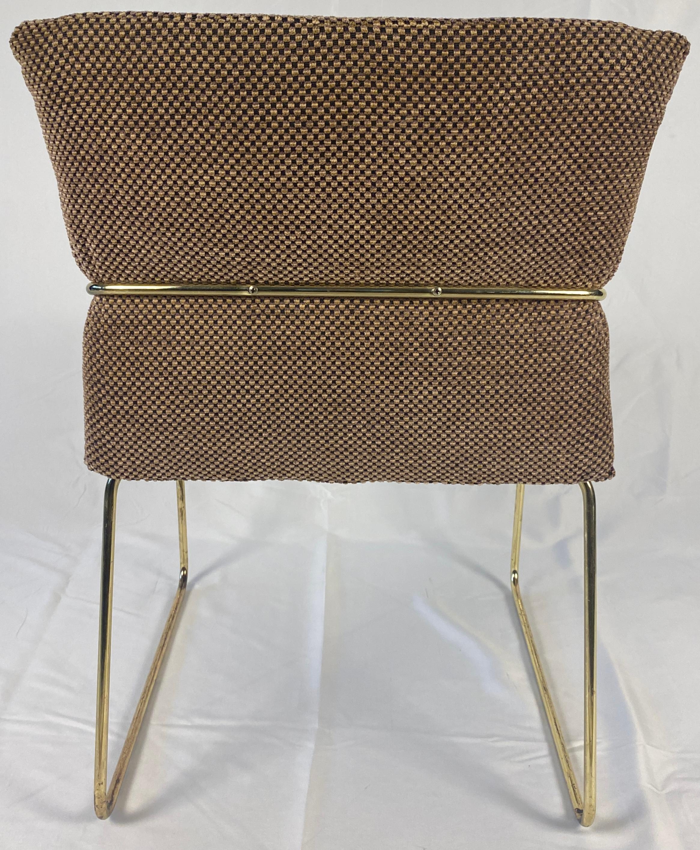 Set of 4 Brass Side Chairs or Upholstered Dining Chairs in the style of Milo Baughman.

This set of 4 dining chairs with tubular frames in polished brass finish, may have been designed by Milo Baughman for Thayer Coggin, USA are circa 1970.

Very
