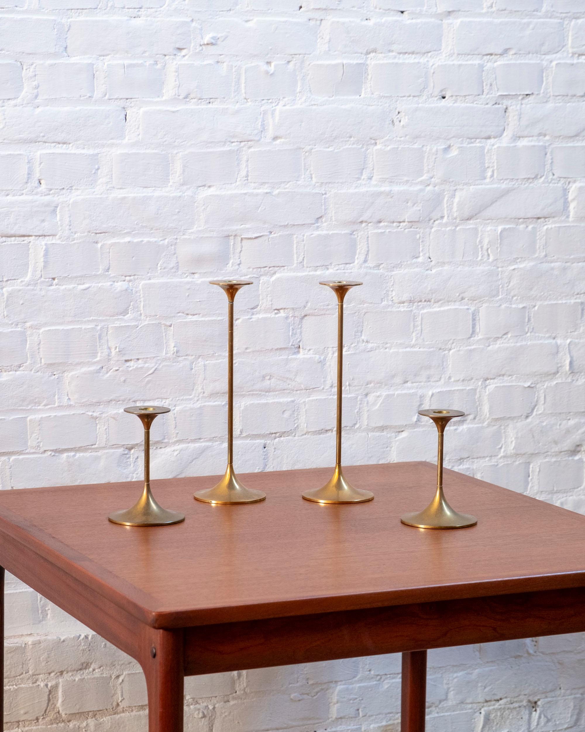 Wonderful set of 4 Mid-Century Modern brass candle holders designed by Max Brüel for Torben Ørskov.
Stamped at the base and top “TØ made in Denmark“.
Age related wear and patina in accordance with age.

Measurements: Two candleholders with a height