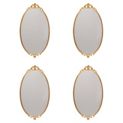 set of 4 Brass Classic medallion shaped wall Mirrors  1970s