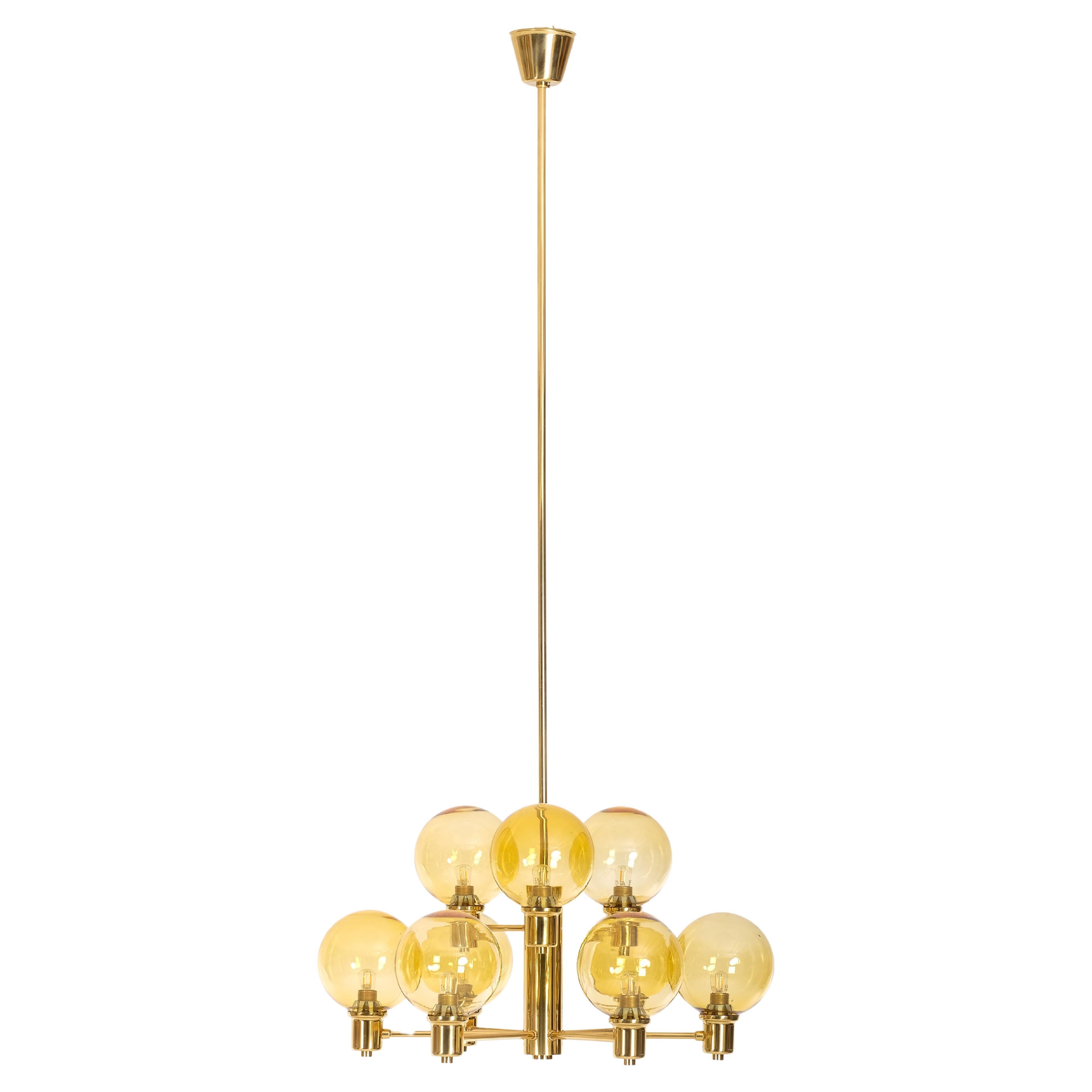 Scandinavian Modern Set of 4 brass & glass chandeliers, Sweden, 1960s For Sale