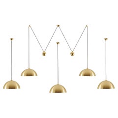 Set of 4  Brass Pendant Lights by Florian Schulz for Trever