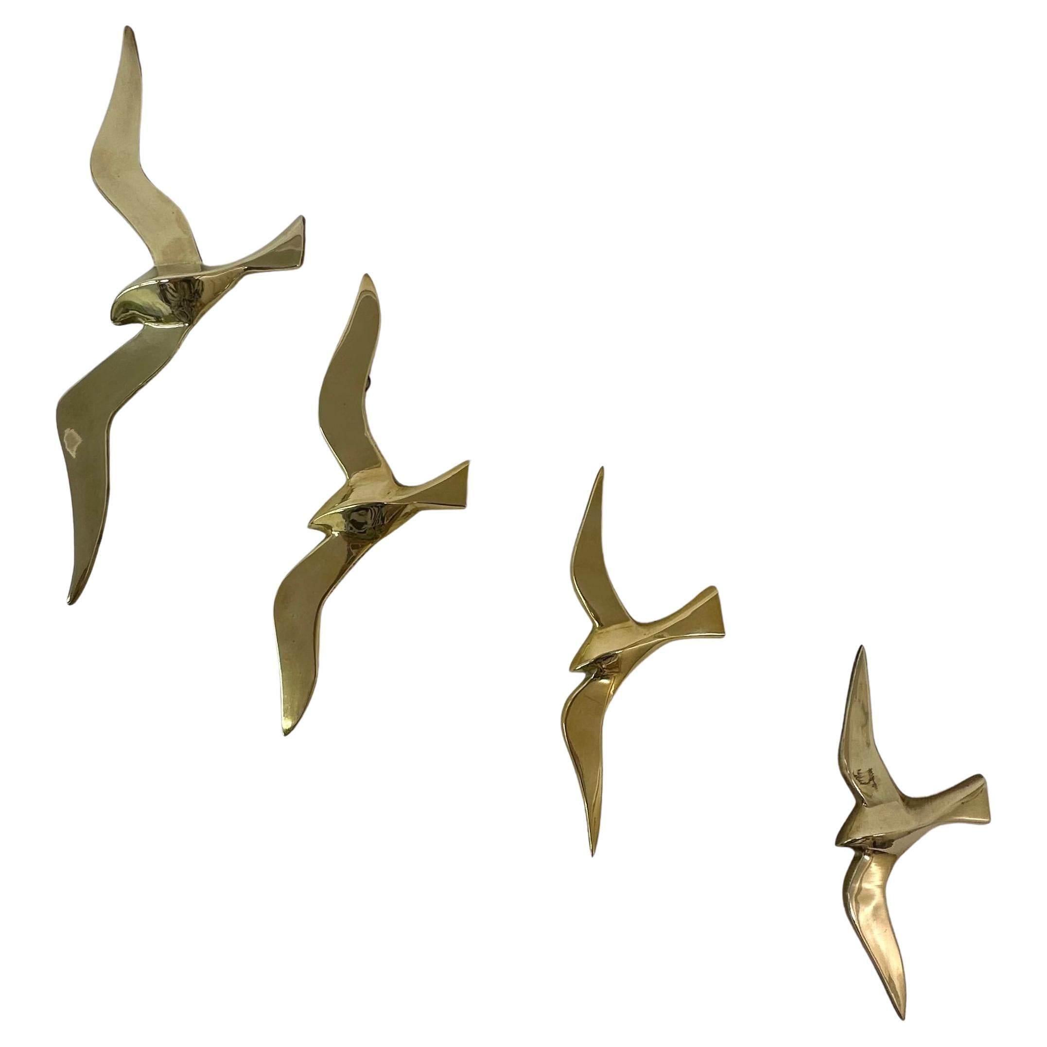 Set of 4 brass wall sculpture birds , 1970’s For Sale