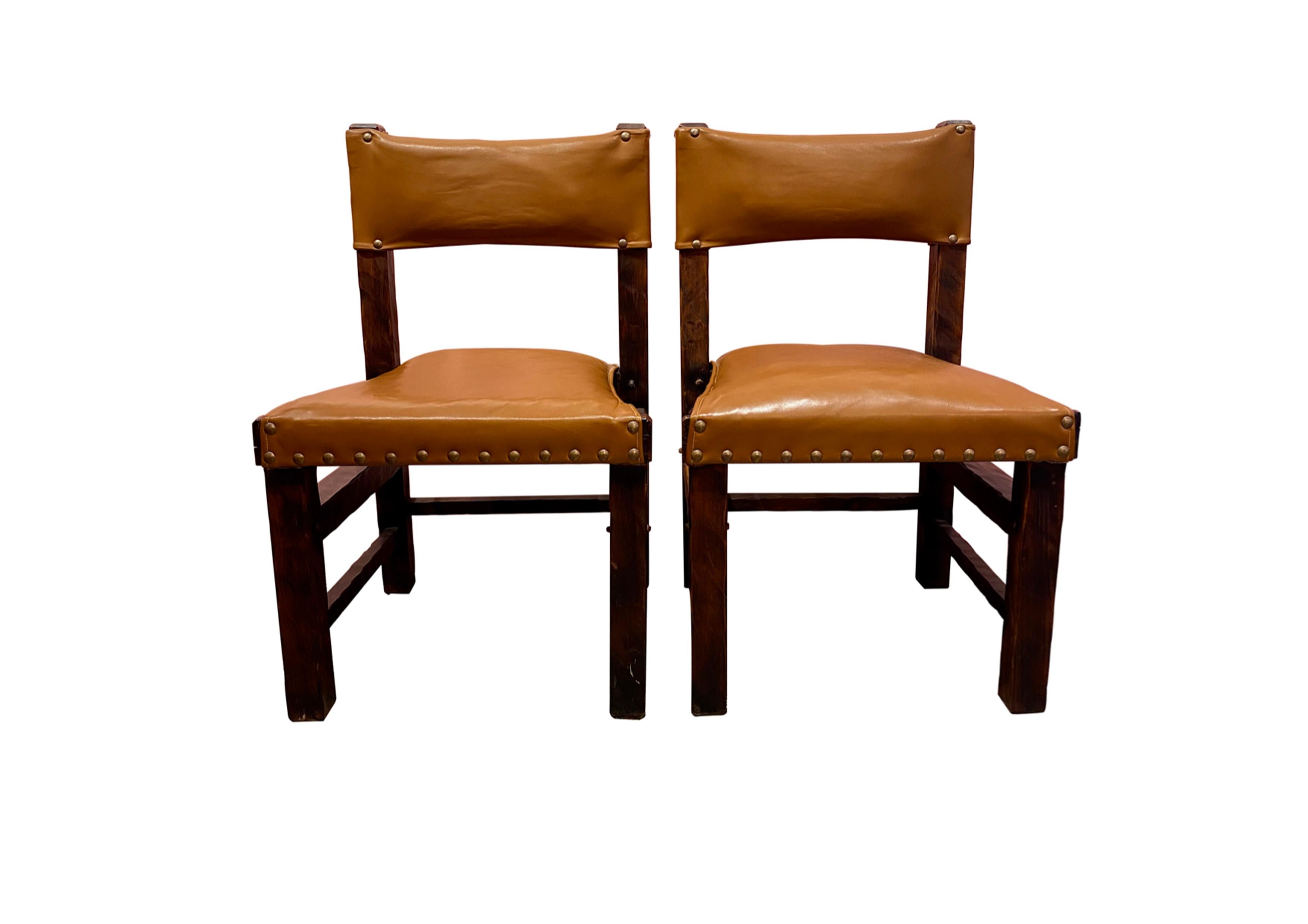 Mid-Century Modern Set of 4 Brazilian chairs from the 60's in leather and wood. For Sale
