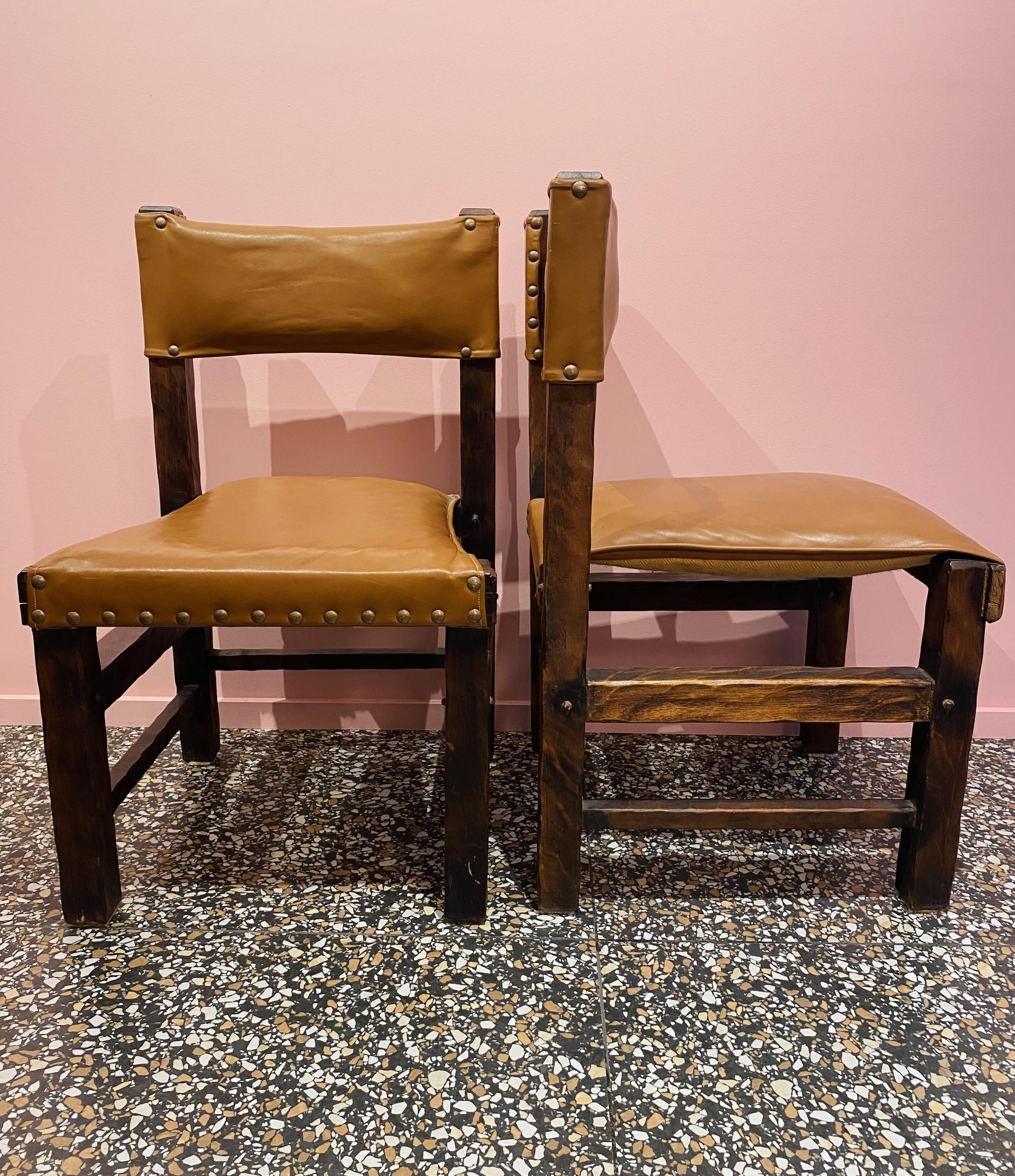 Mid-20th Century Set of 4 Brazilian chairs from the 60's in leather and wood. For Sale