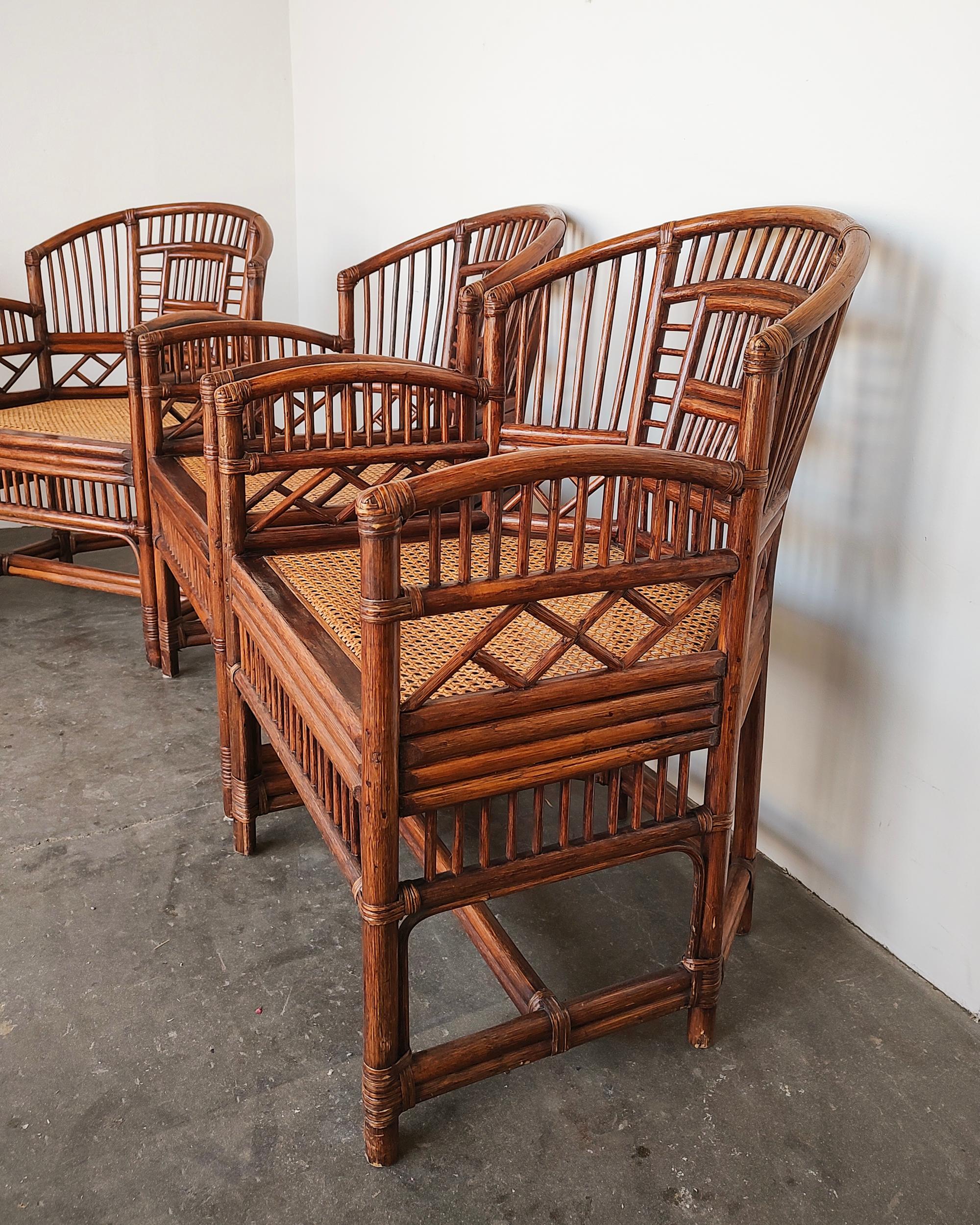 Set of four vintage Brighton Pavillion armchairs with intricate bamboo frames and cane seats. Overall great condition, some light wear present throughout.

22.25