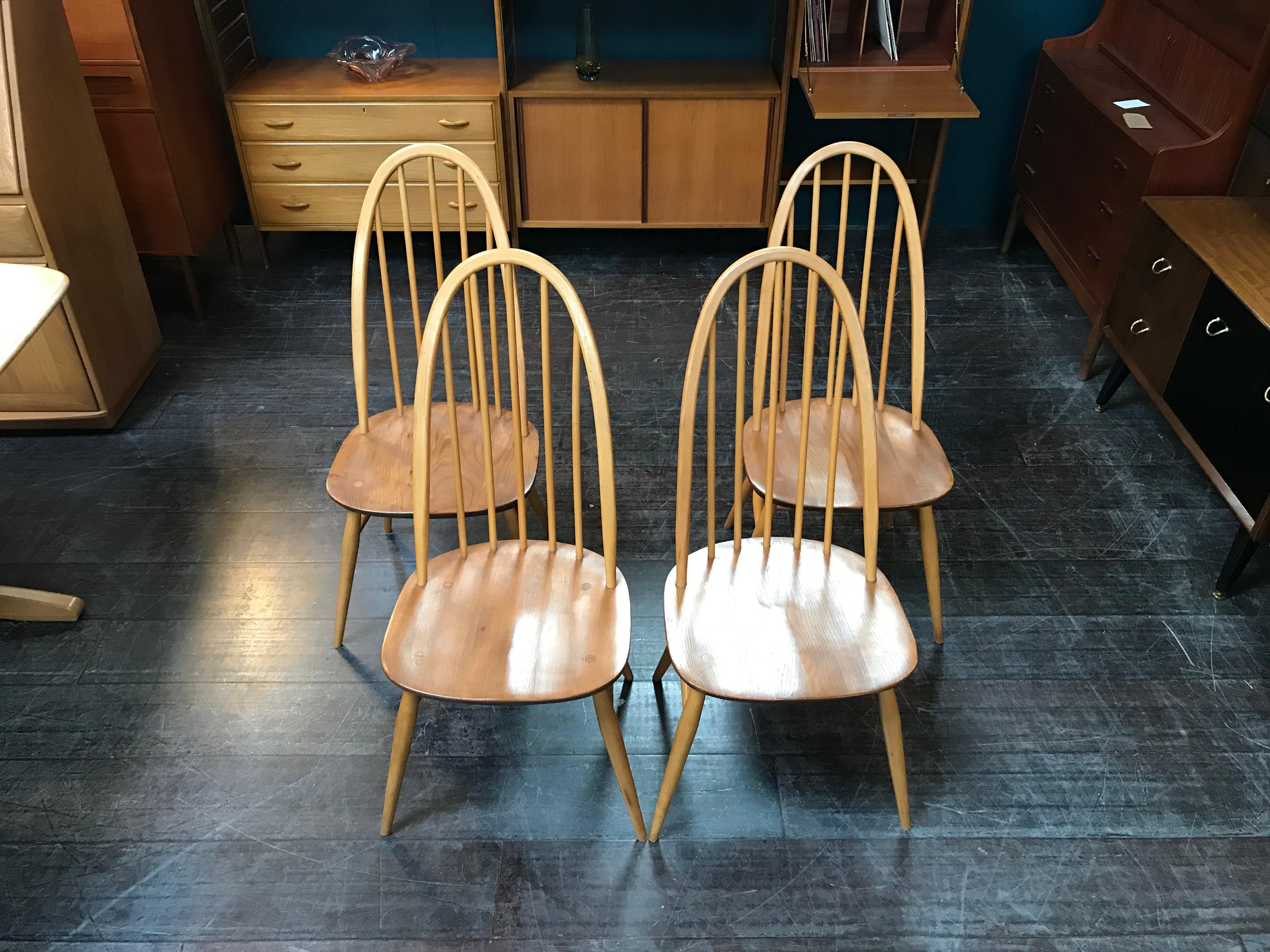 This is a set of Quaker dining chairs in sought-after light wood. Perfect for any living space, these beautiful chairs are made from solid elm and beech. They feature Ercol’s characteristic stick-back look, creating a greater sense of space and