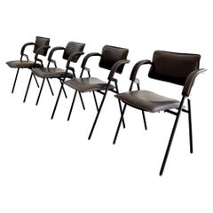 Set of 4 Brown Jacques Adnet Chairs