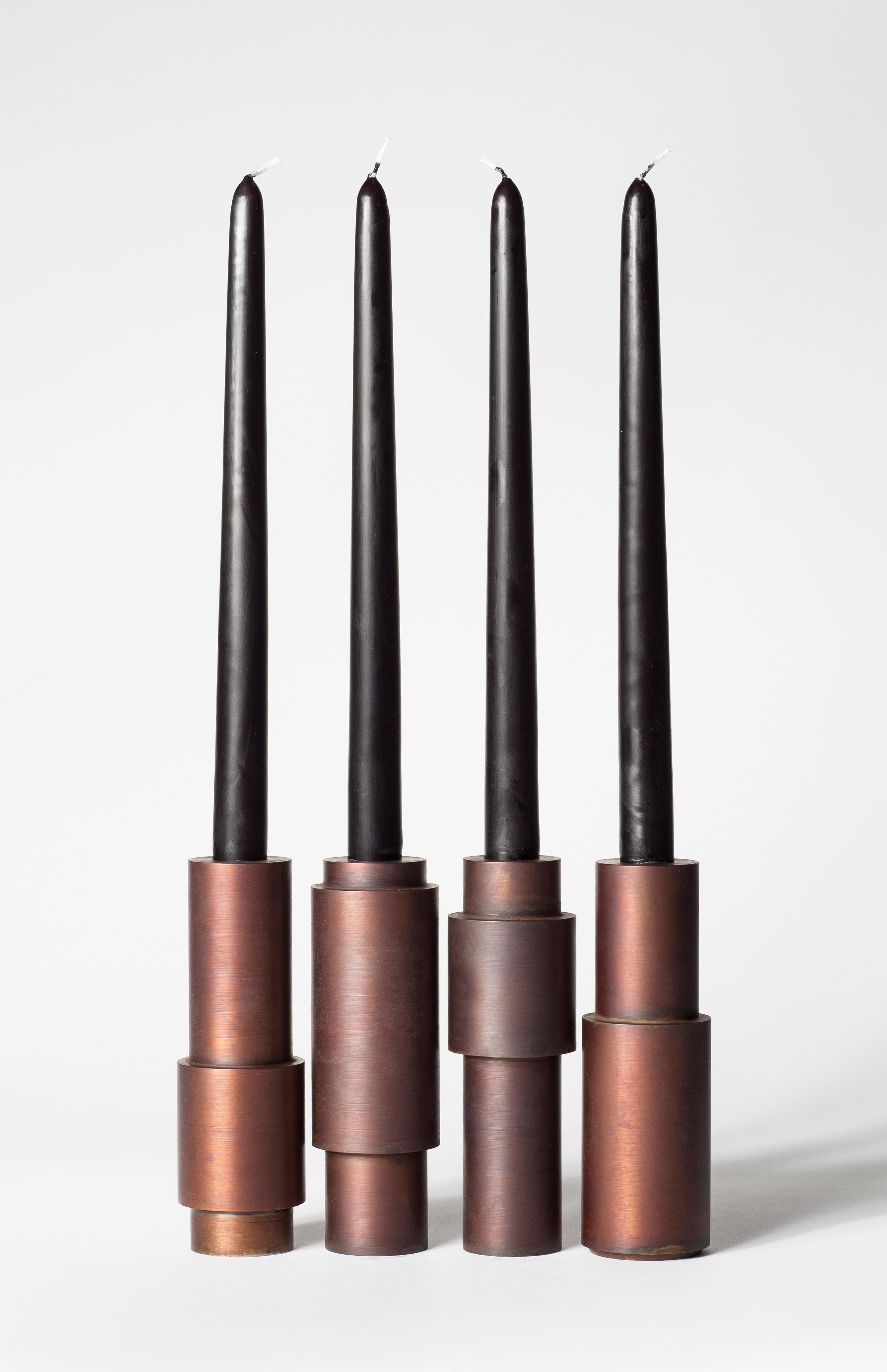 Set of 4 brown patina steel candlestick by Lukasz Friedrich
Dimensions: D 5 x H 15 cm
Materials: Brown patina on steel.
