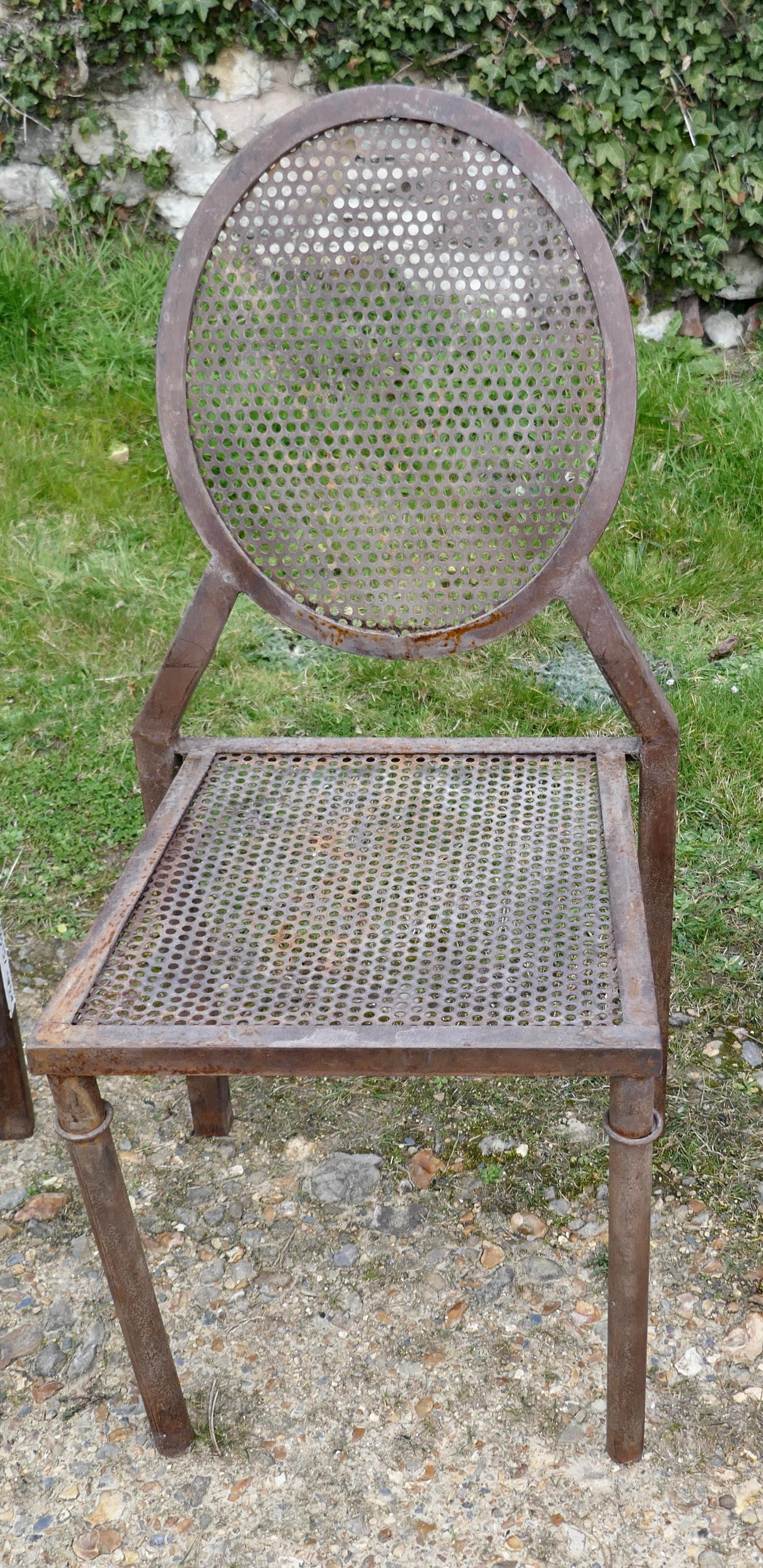 Set of 4 Brutalist Iron Stacking Dining Chairs For Sale 1