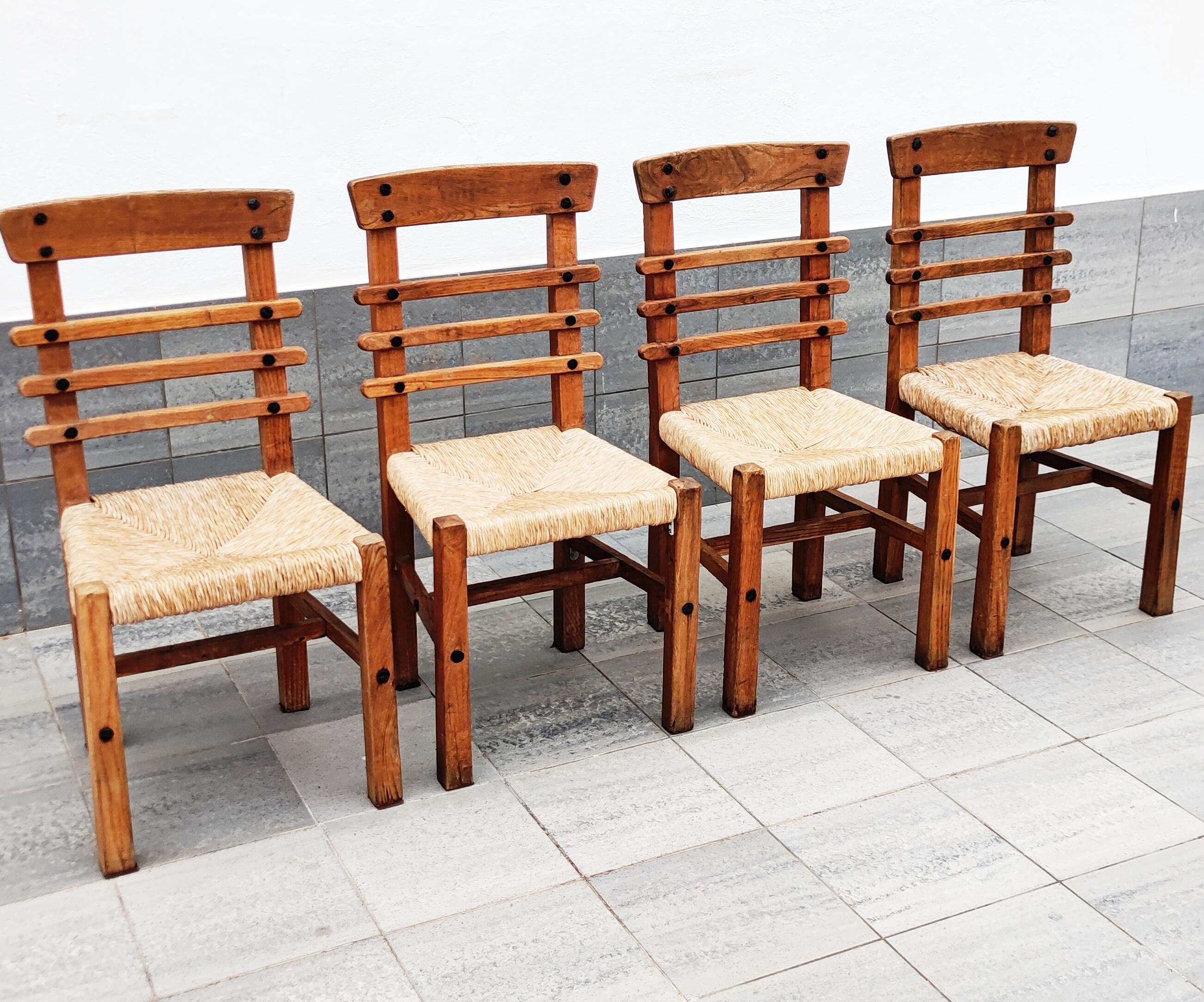 Beautiful and rare set of 4 brutalist oak and straw dining chairs manufactured in Spain in 1950s.
In very good vintage condition.
