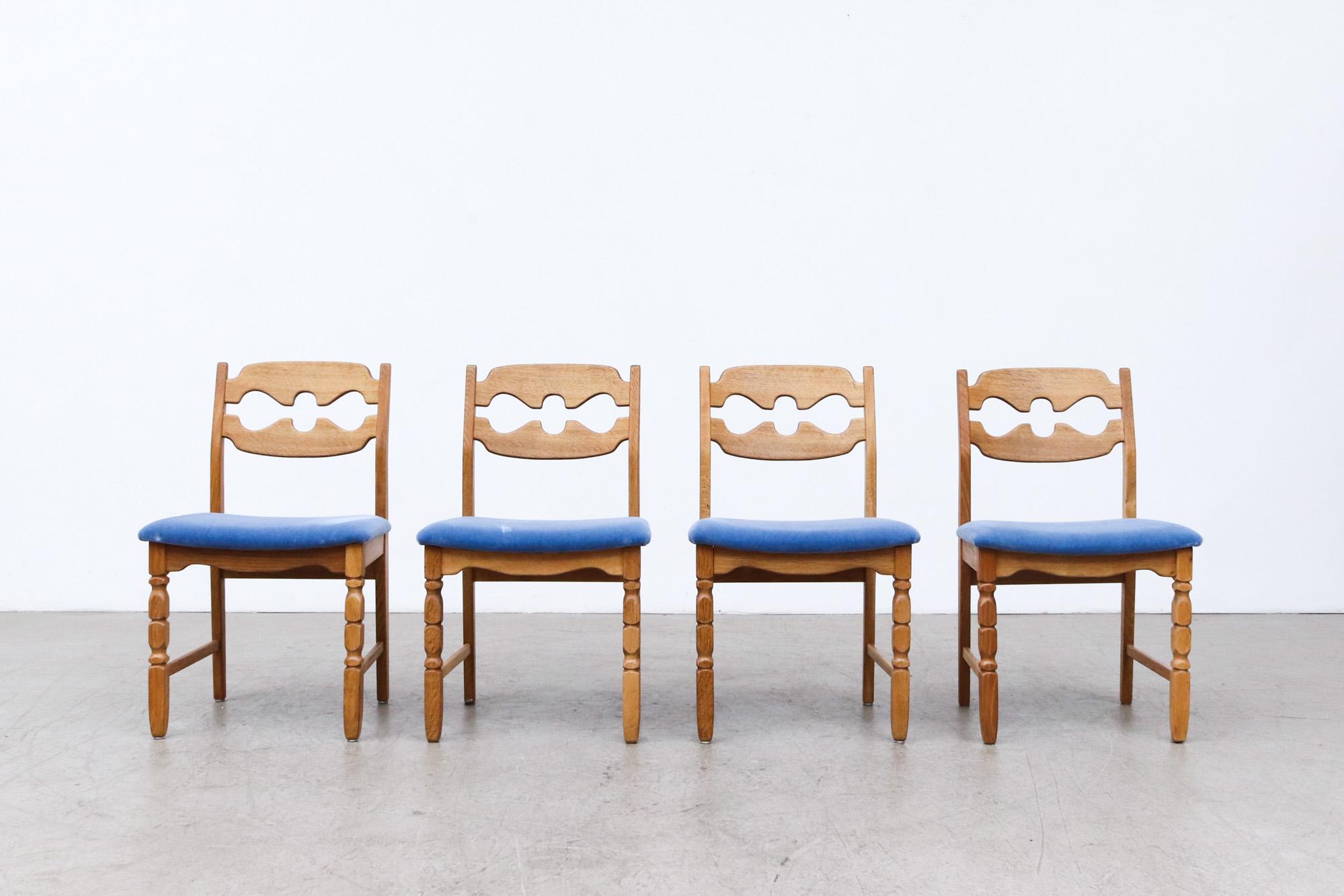 Set of 4 Brutalist Razor back oak dining chairs by Henning Kjaernulf for Nyrup Møbelfabrik with Upholstered Blue Velvet Seats. Shown with matching dining table with 2 Extension Leaves (sold). In original condition with wear consistent with their age