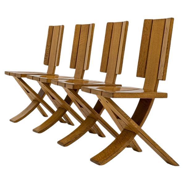 Set of 4 brutalist, sculptural Ebénisterie Seltz dining chairs, France, 1970s