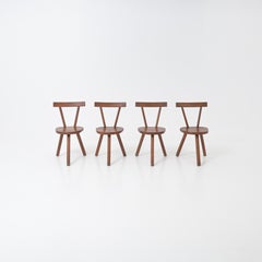 set of 4 Brutalist wooden chair in the style of Jean Touret