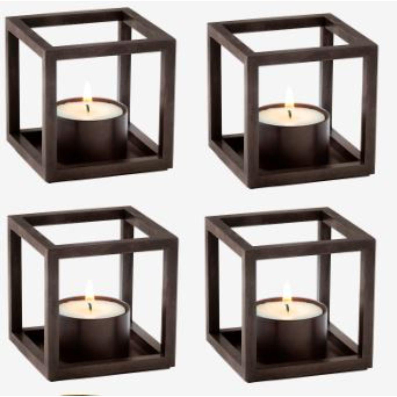 Set Of 4 Burnished Copper Kubus T Candle Holders by Lassen
Dimensions: D 7 x W 7 x H 7 cm 
Materials: Metal 
Also available in different dimensions and colors. 
Weight: 0.40 Kg

The tealight, Kubus T, is added to the Kubus collection in 2018,