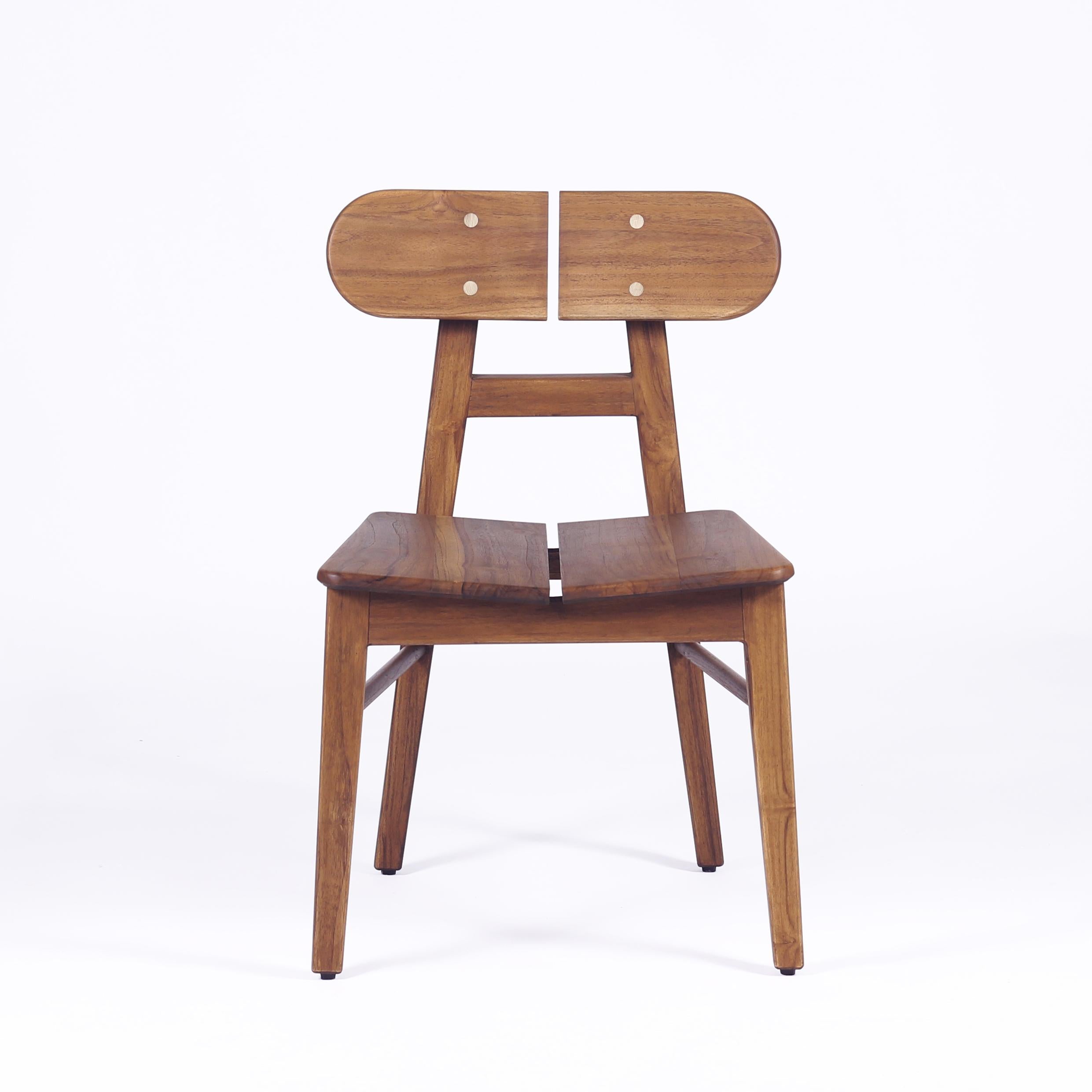 A set of 4 solid Oak wood chairs crafted for comfort and a timeless aesthetic, the BUTTERFLY chair design is inspired by the beauty of a butterfly and developed through a design philosophy of conscious minimalism. The design makes a sophisticated