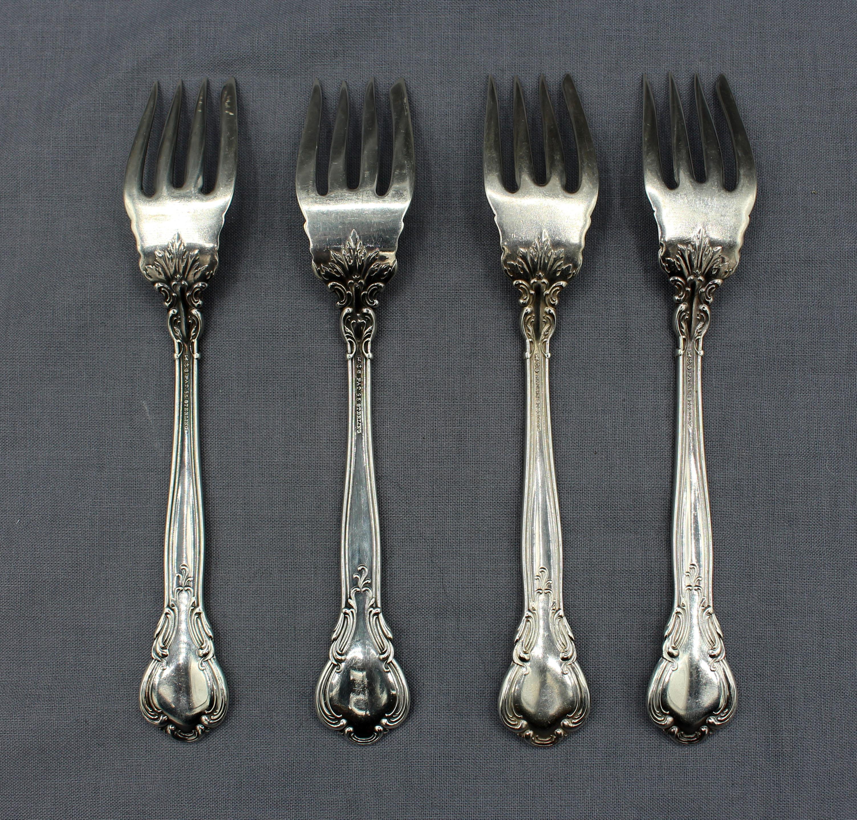 Set of 4 Chantilly sterling silver small fish forks by Gorham, 1895-1950. Monogram 
