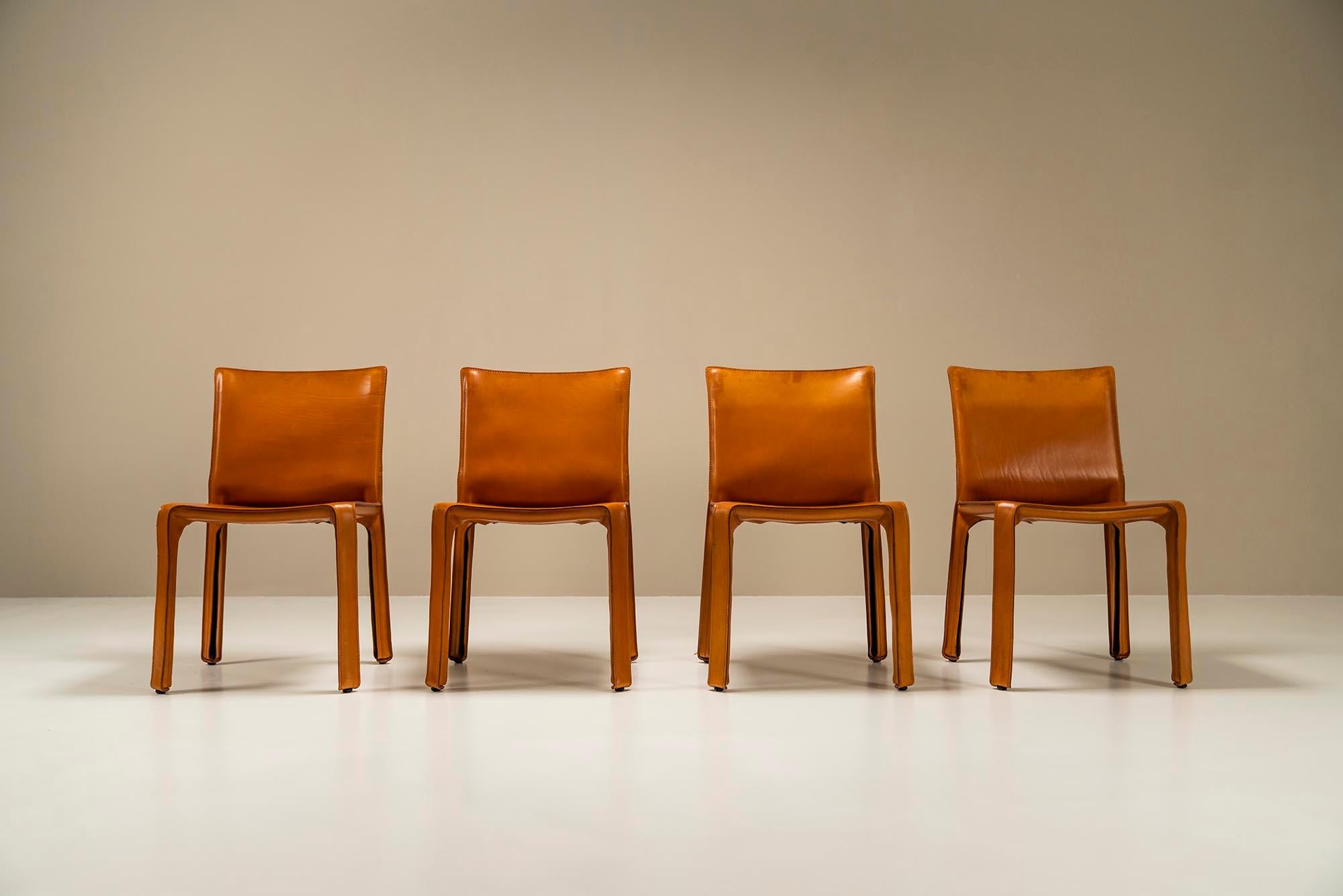 Of course, known for their presence in the MoMa in New York are these CAB chairs by the Italian architect and designer Mario Bellini. Its design communicates an exercise in simplicity, craftsmanship, and beauty. The cognac-colored saddle leather has