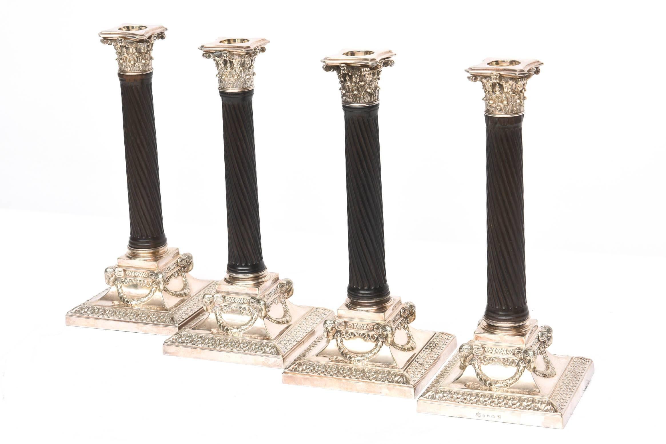 These candlesticks were made by the re known firm of Elkington, Birmingham, England, circa 1920. They feature beautifully carved columns, rose garlands and figural ram's head bases. They are in lovely antique condition.
Elkington Silver company is