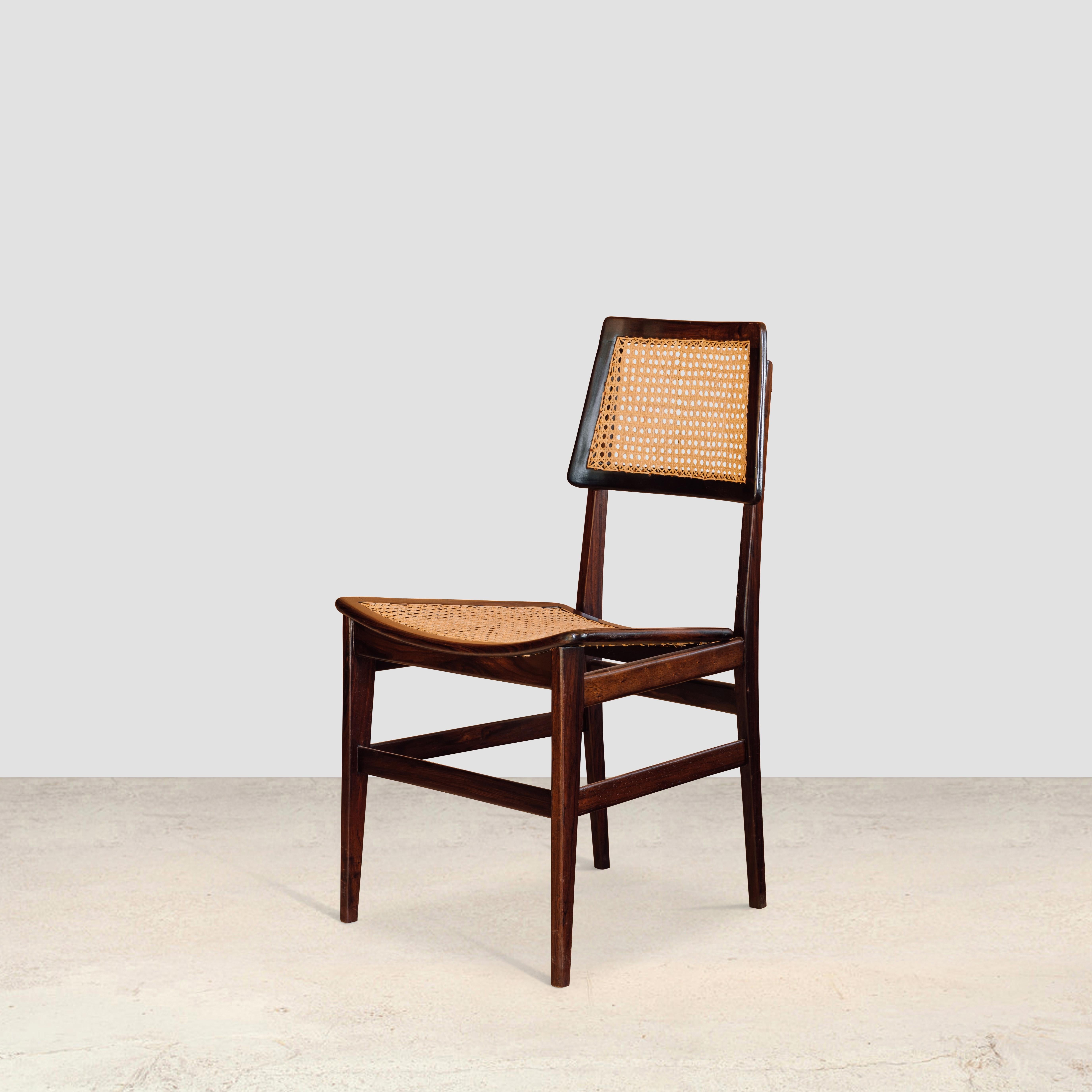 Set of 4 cane and rosewood side chairs
By Joaquim Tenreiro 1960

Tenreiro championed furniture that was “formally light”, as he described; working in wicker and tropical hardwoods to suit the hot climate of Brazil, he is a prime example of a