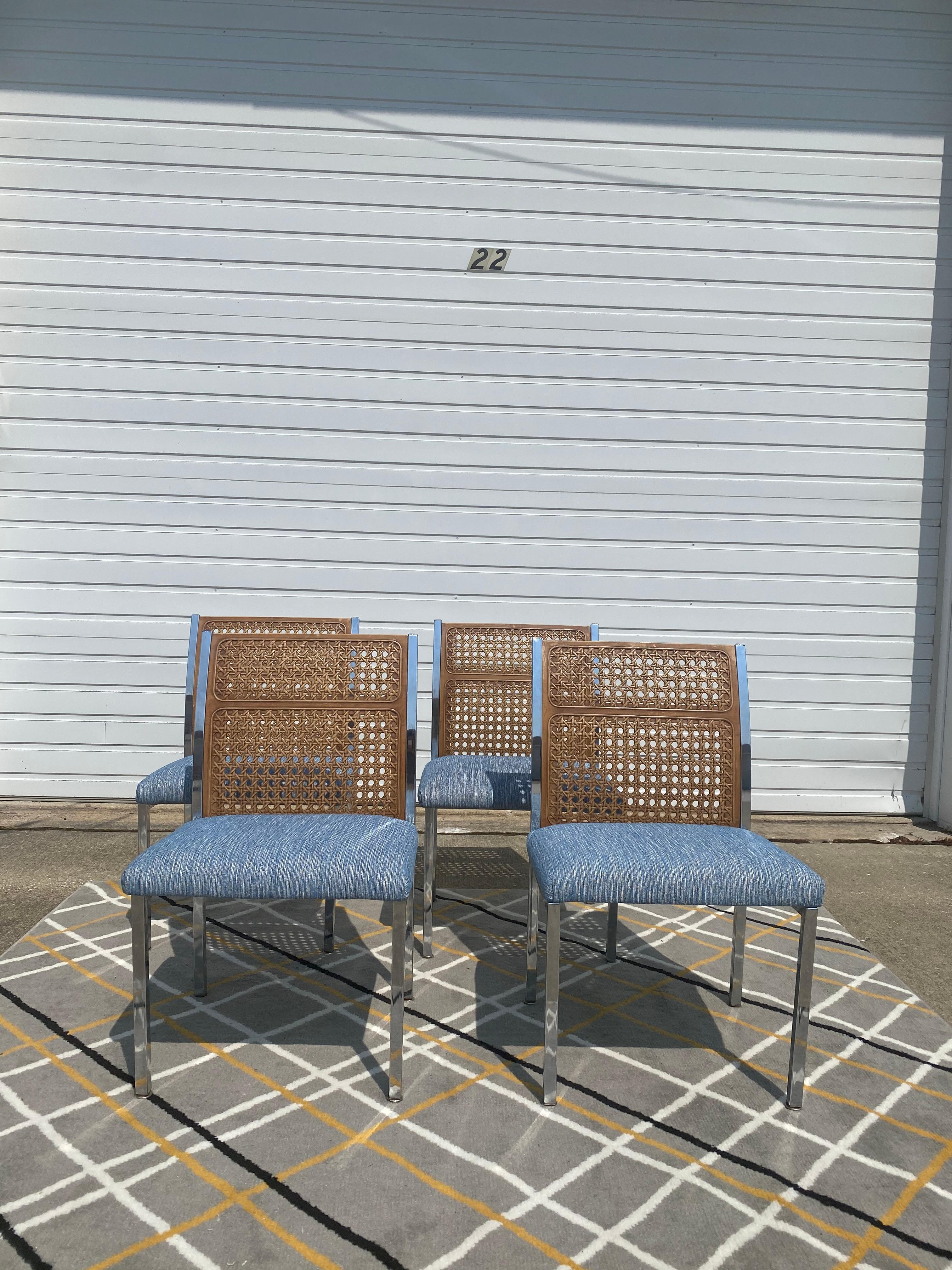 These neat cane back chairs with metal frames are newly reupholstered in a beautiful blue/white fabric. There are no breaks in the cane but with all vintage the metal frames are not perfect, see pictures. Overall, they are in great condition and is