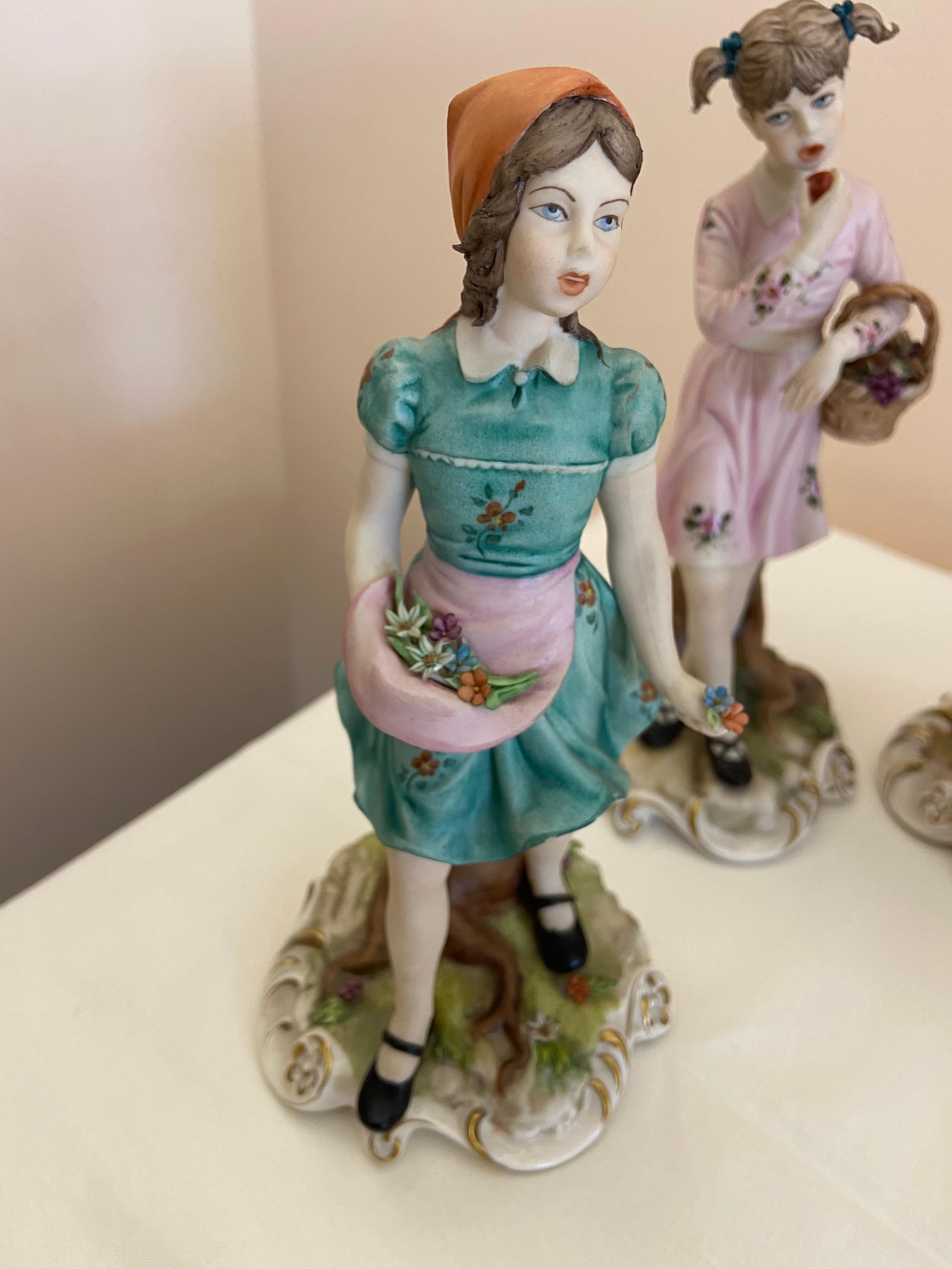 Set of 4 Capodimonte Porcelain Figurines, the 