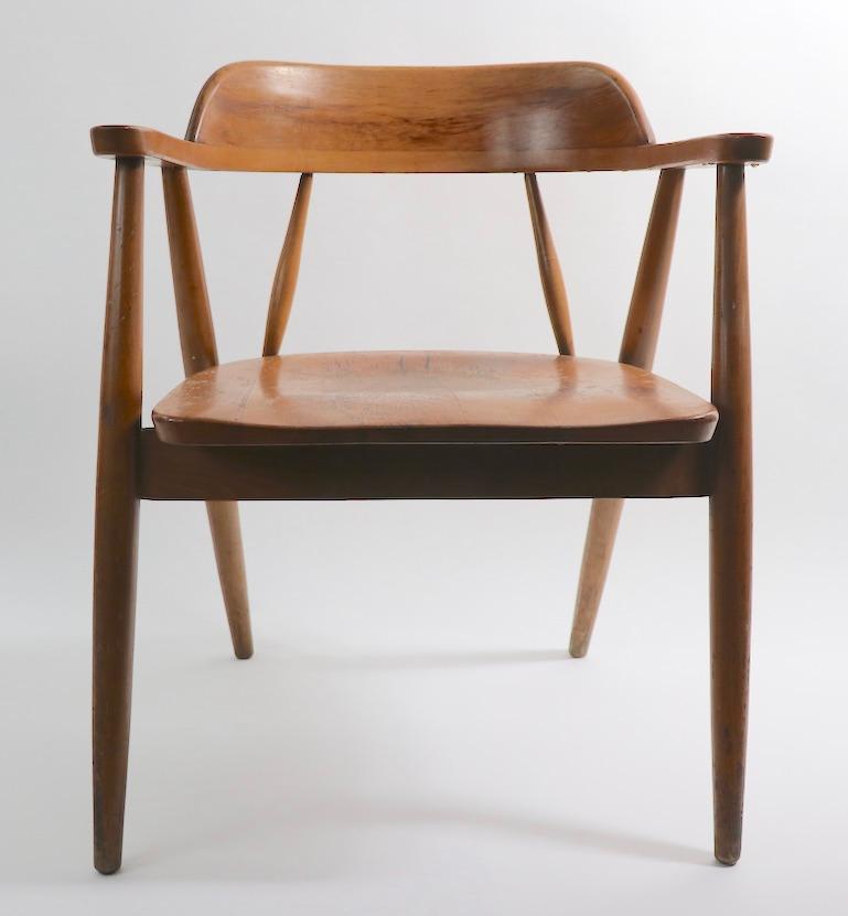 Interesting architectural form midcentury armchairs, constructed of solid wood. The chairs are in good, original condition, all show signs of use, and general cosmetic wear. Reminiscent of the New Hope School, or Cushman, unsigned.
Offered and