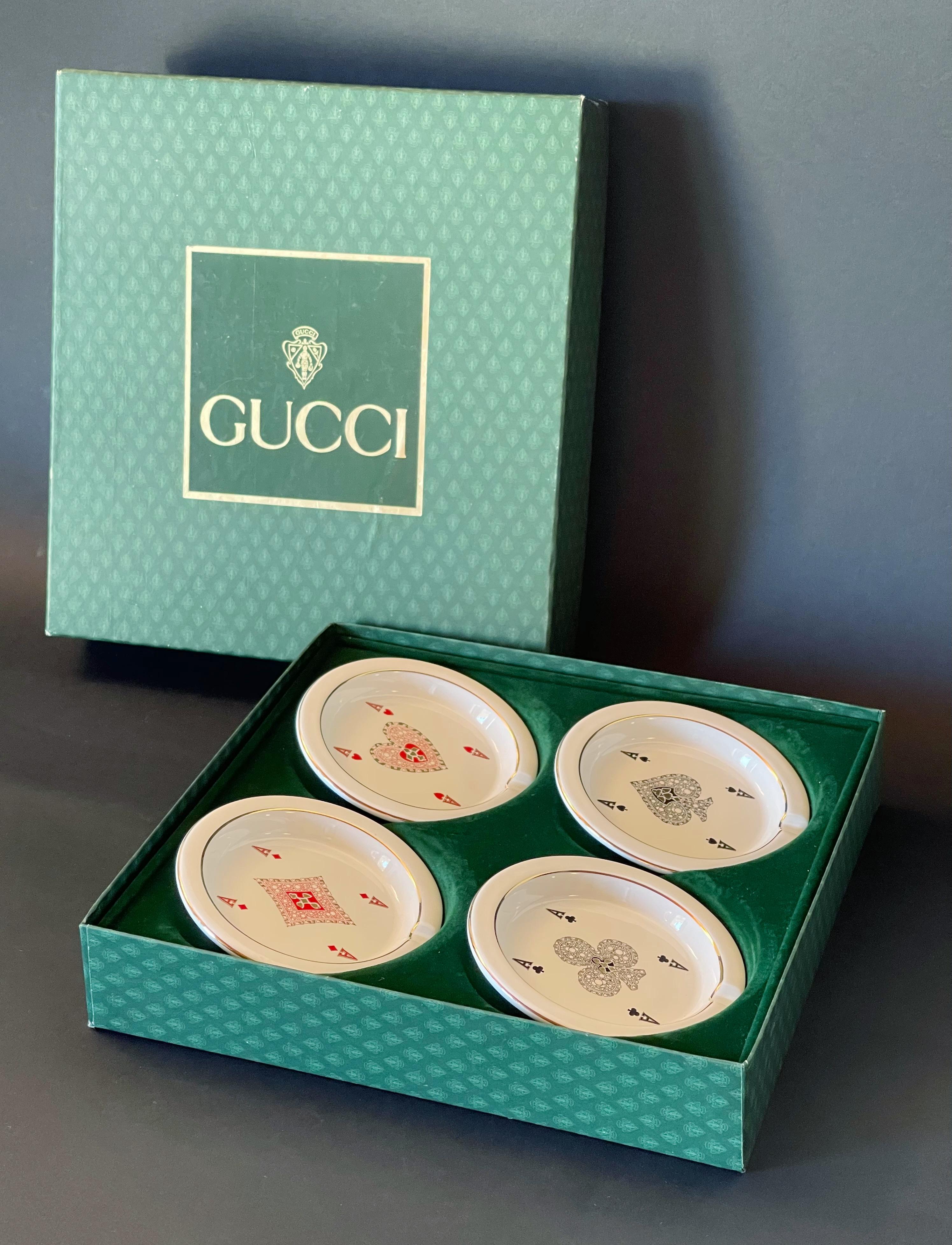 Set of 4 vintage Gucci ceramic ashtrays in the motif of poker cards, can also be used as vide poche, change tray, or pocket emptier / Made in Italy
Original stamp on the base / come in original box
Diameter: 4 inches, height 0.5 inch
set of 4