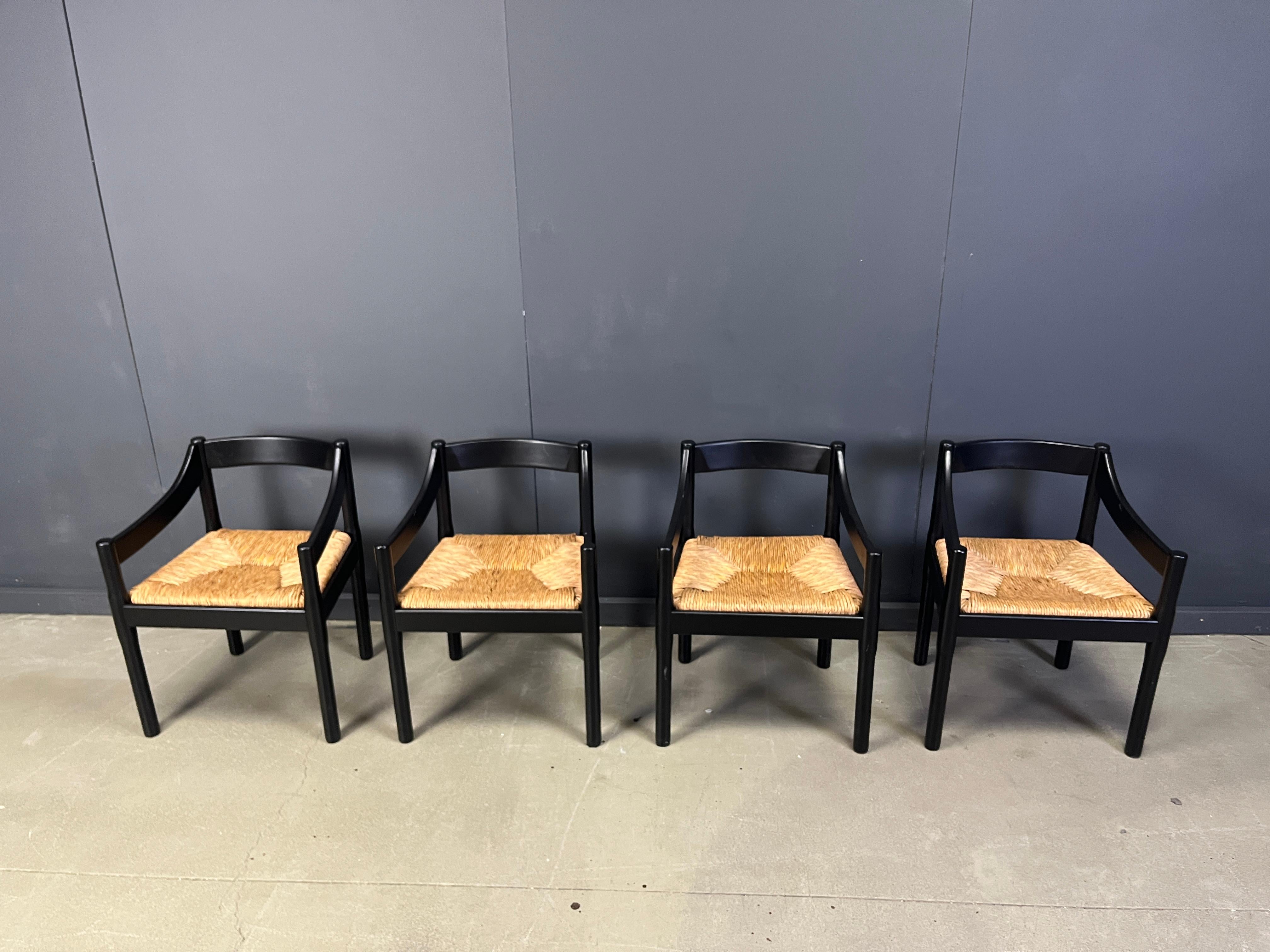 Ebonized Set of 4 carimate armchairs by Vico Magistretti, 1960s For Sale