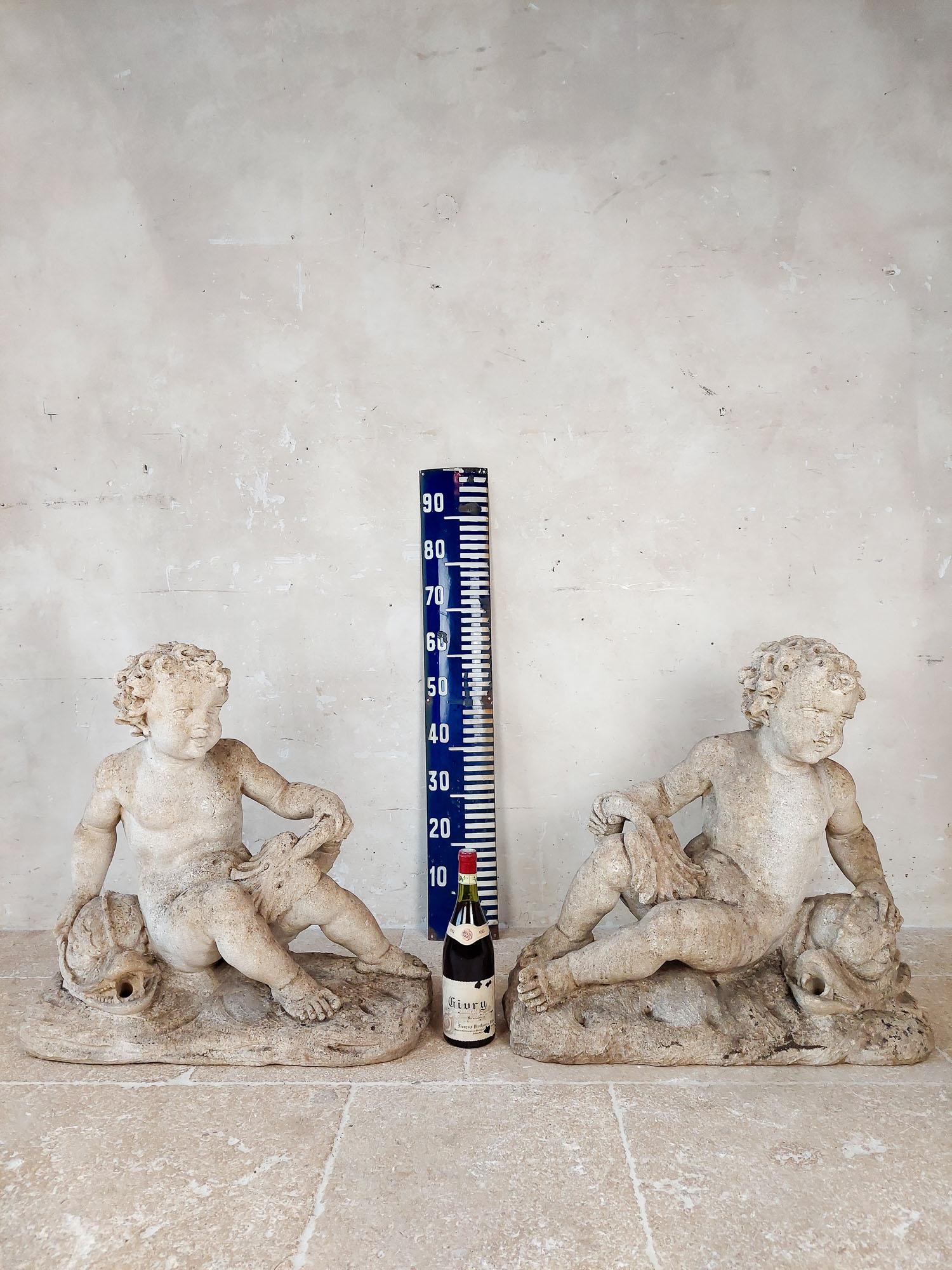 Set of 4 carved limestone fountain putti seated with dolphins For Sale 5