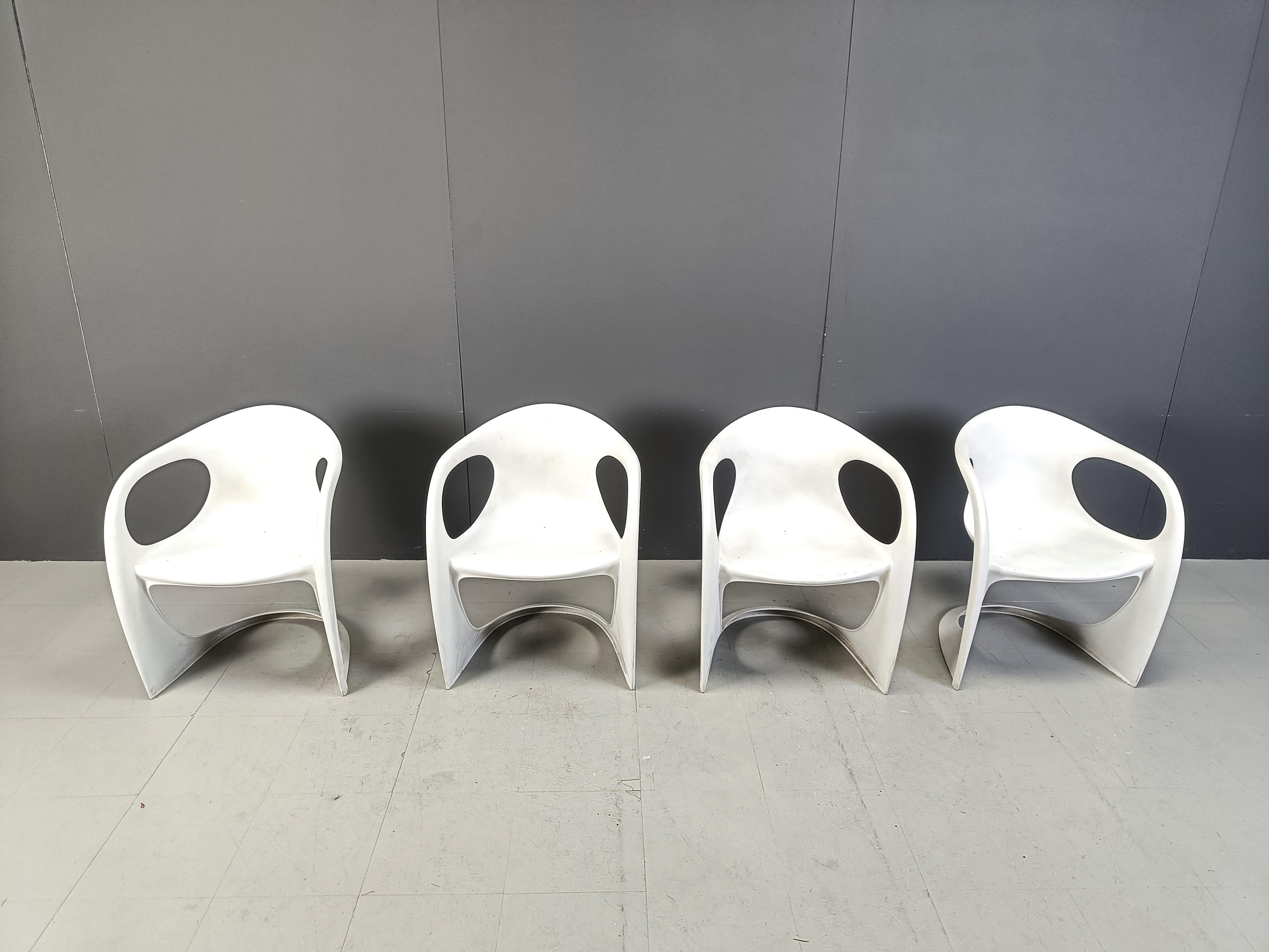 Set of 4 space age era dining chairs designed by Alexander Begge for Casala.

Made from moulded plastic with beautiful space age design lines.

1970s - Germany

Dimensions: 
Height: 73cm
Width: 58cm
Depth: 58cm
Seat Height: 42cm

*price is for the