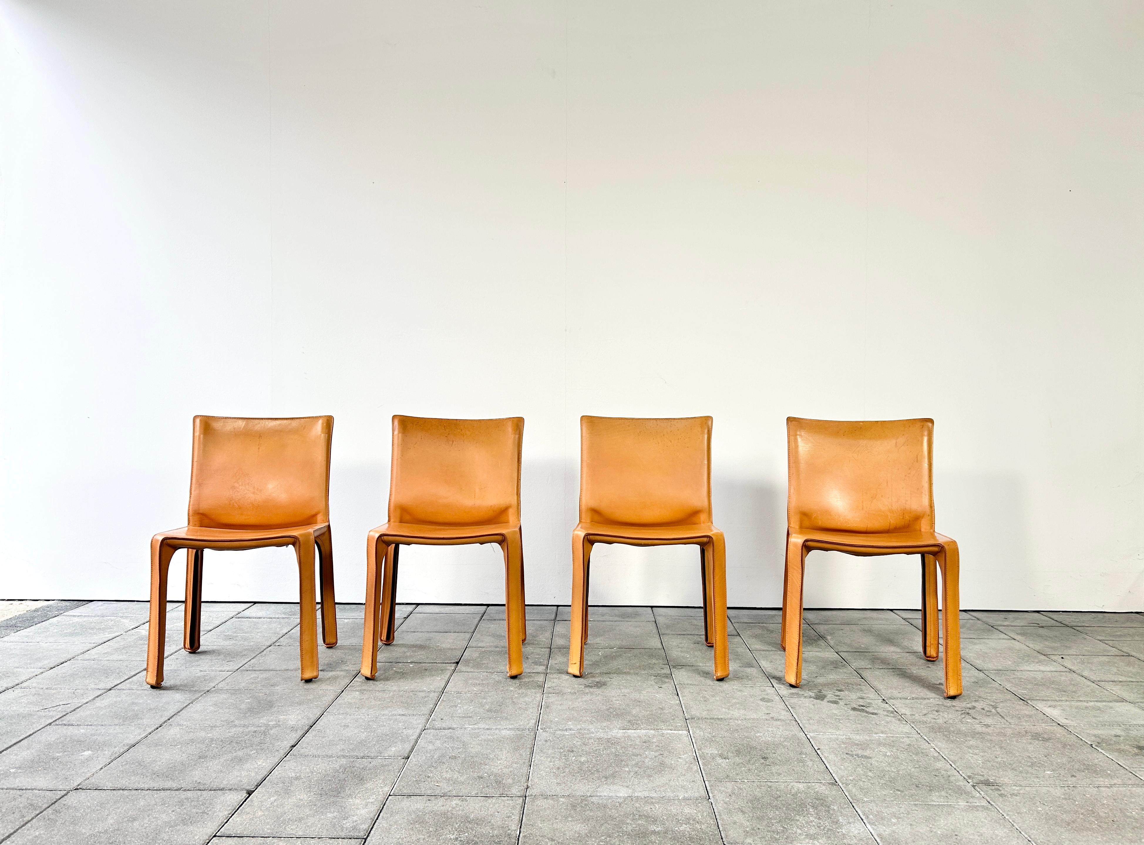 Beautiful set of four Cab Chairs in natural leather hide, designed by Mario Bellini in 1976. 

Manufactured by Cassina in circa 1990. The set consists of four cab412 dining chairs.


The Cab chair series today is a true icon of late 1970s Italian
