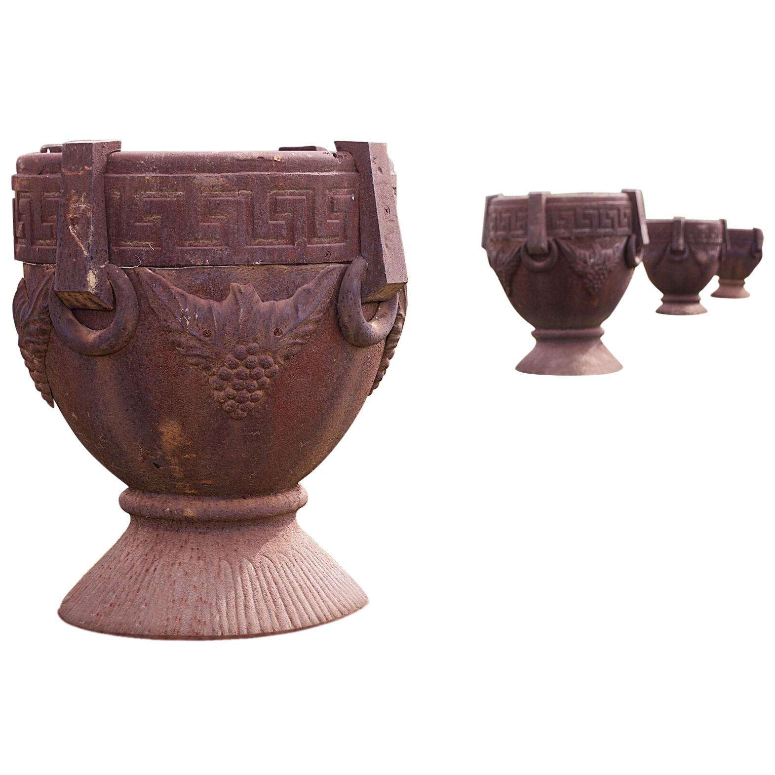Set of 4 Cast Iron Garden Urns, after the Antique in the Greek Style