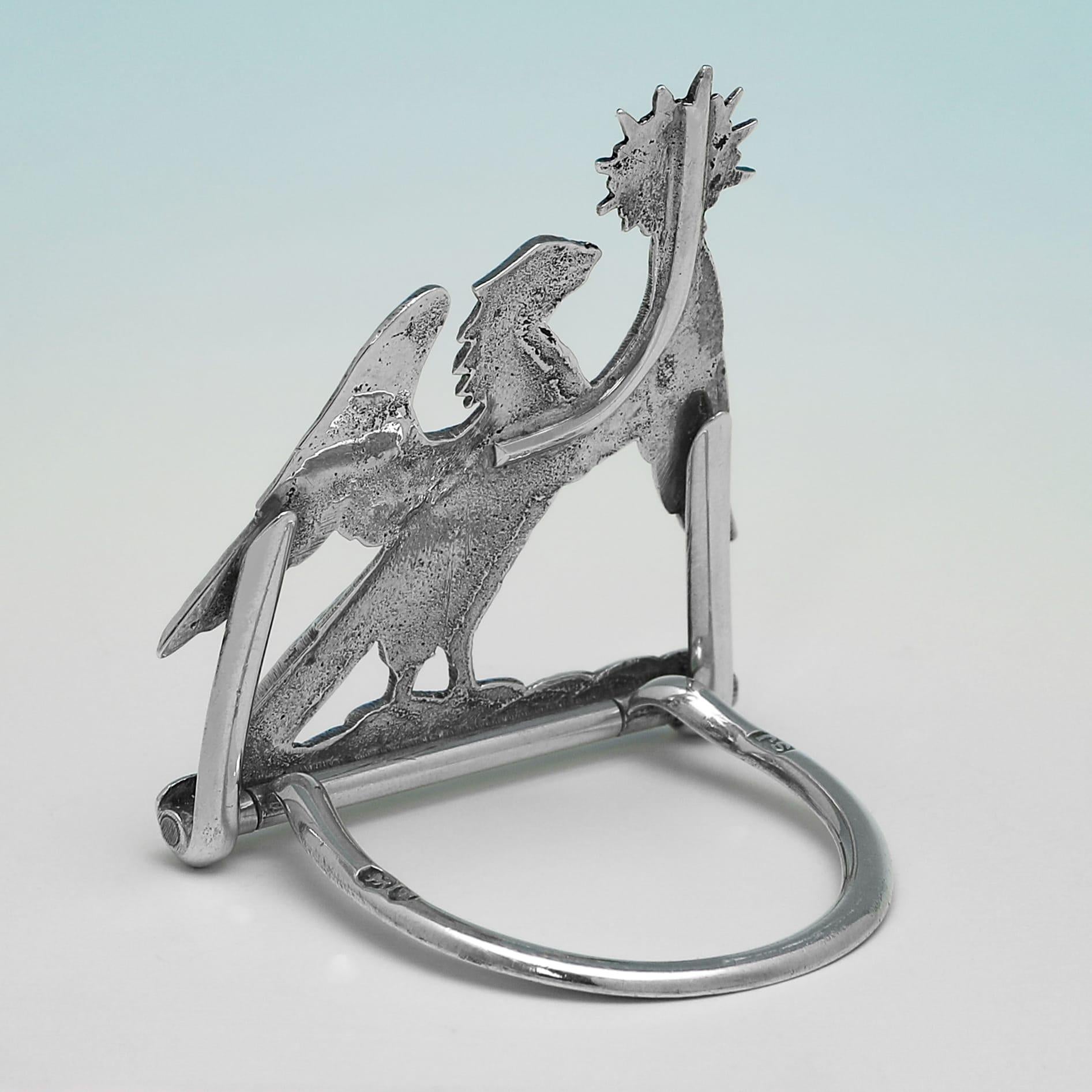 English Set of 4 cast sterling silver menu holders modelled as crests made in 1891 For Sale