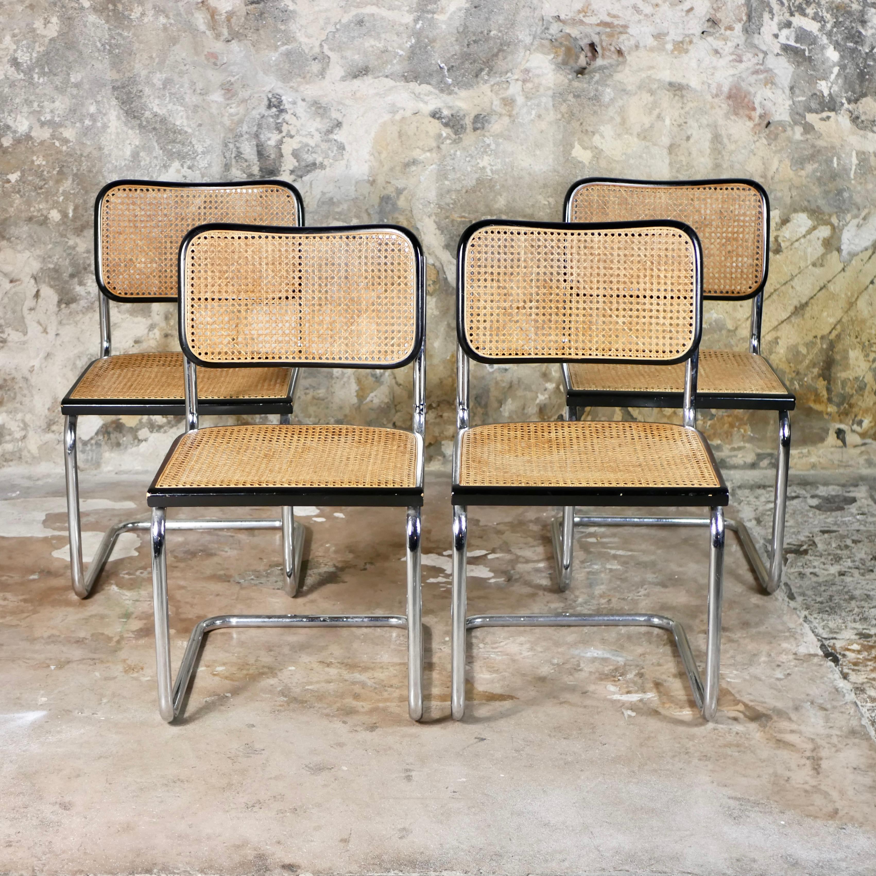 Beautiful set of 4 Cesca chairs designed in 1928 by Marcel Breuer.
These have been made in Italy in the 1970s.
Original cane seats, black lacquered beech wood frame, tubular metal structure.
In good condition, nice details.
