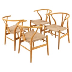 Ensemble de 4 fauteuils de salle à manger CH 24 de Hans J. Wegner