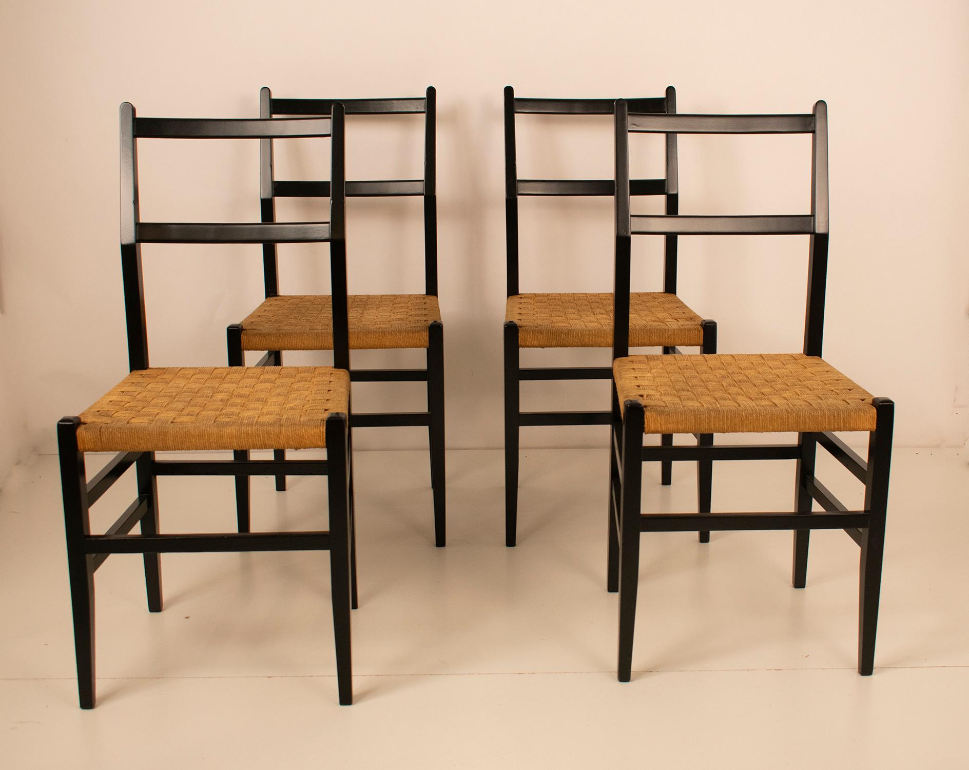 Set of 4 chairs, In black lacquered wood and Cane seat. Spain 1950s.
The wood has been lacquered again, the seat is in its original state, which is in good condition, only there are some stains
The 699 Superleggera chair, designed in 1957 by the