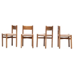 Ensemble de 4 chaises par Charlotte Perriand. Ed. Steph Simon chaise de salle à manger chaise en jonc
