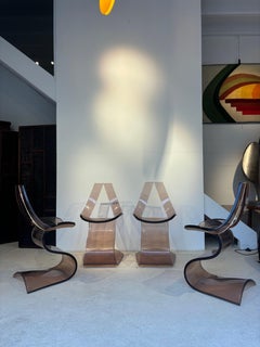 Set of 4 chairs by Michel Dumas
