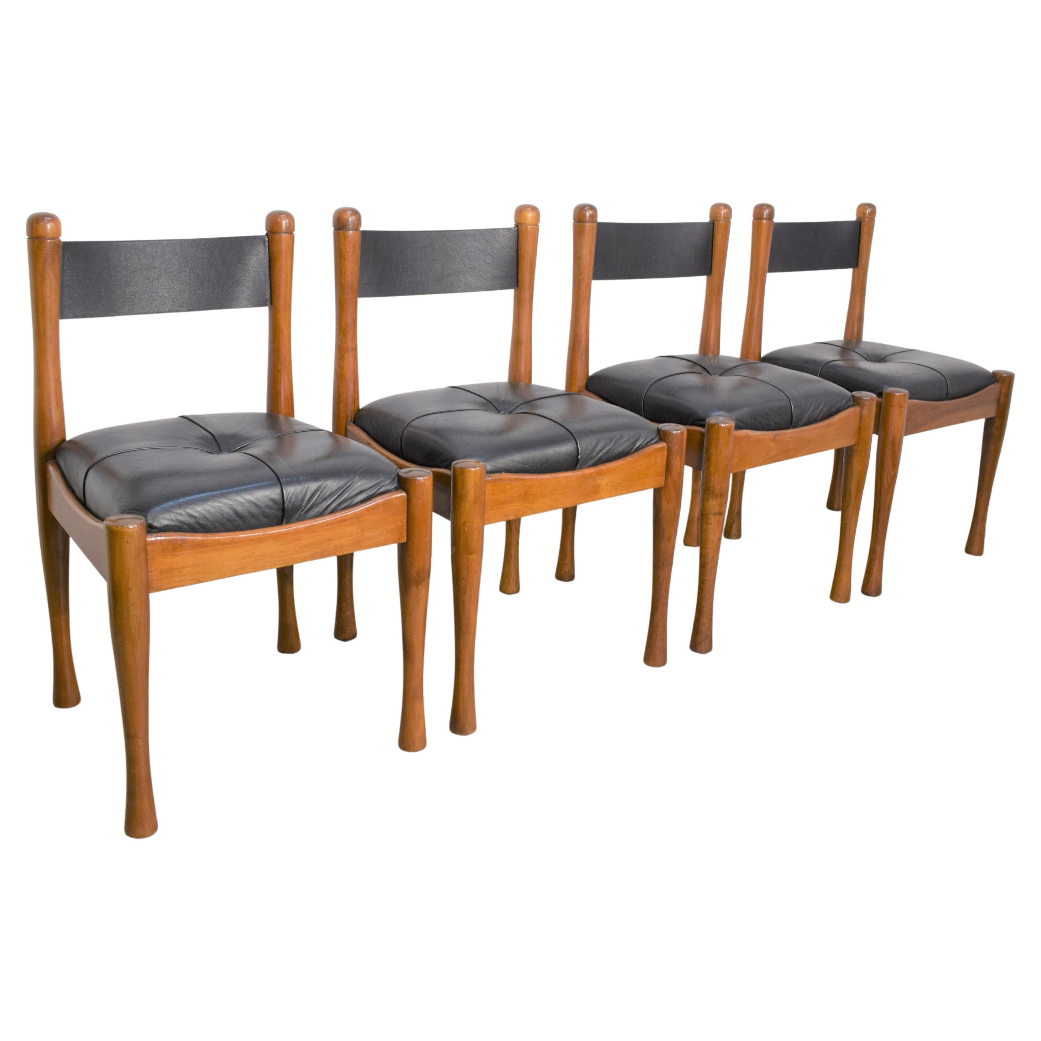 Set of 4 chairs by Silvio Coppola for Bernini, 1960s.

Dimensions: H= 82 cm; W= 45 cm; D= 46 cm; H seat= 47 cm.