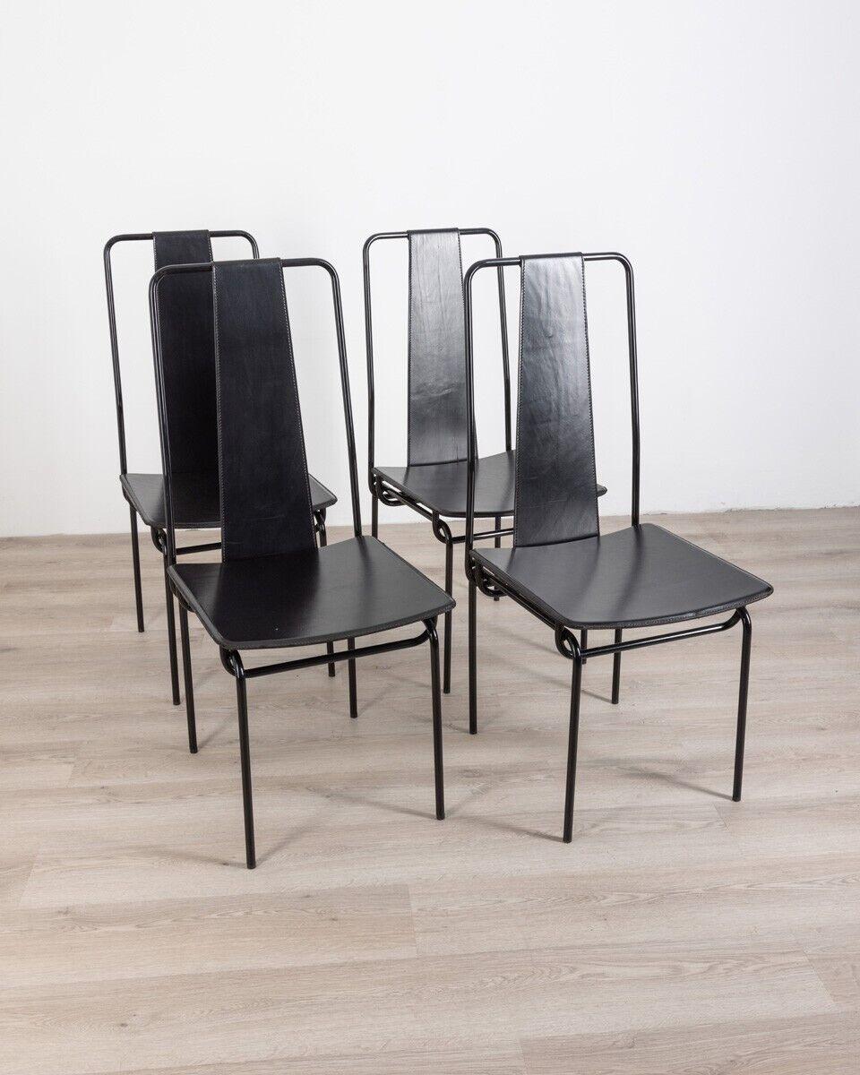 Set of four chairs in black metal with seat and back in black leather. Design Adalberto del Lago for Misura Emme, 1980s.

CONDITIONS: In good condition, it may show signs of wear due to time.

DIMENSIONS: Height 102 cm; Width 48 cm; Length 44