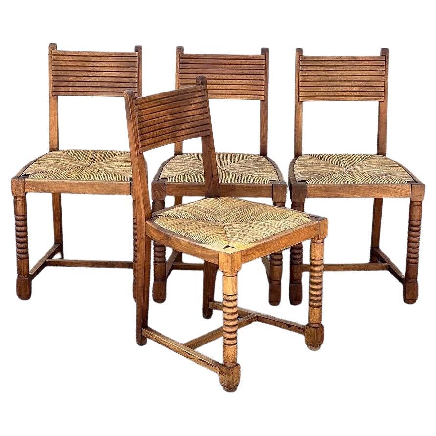 Set of 4 Chairs in Walnut and Straw in the Taste of Victor Courtray