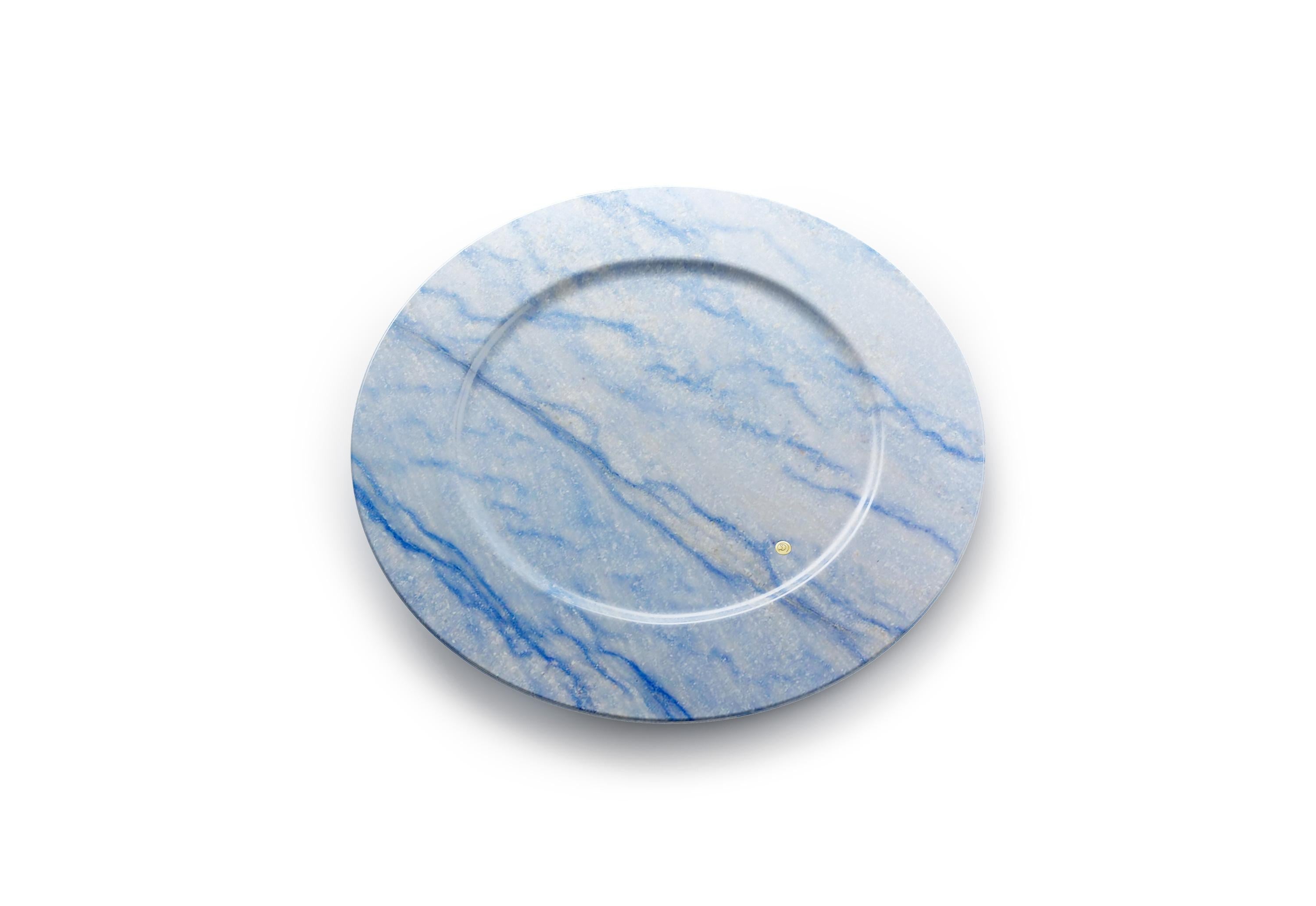 Set of 4 hand carved charger plates from semi-precious quartzite Azul Macaubas. Multiple use as charger plates, plates, platters and placers. 

Dimensions: D 33, H 1.9 cm. Available in different marbles, onyx and quartzite. 

100& Hand made in