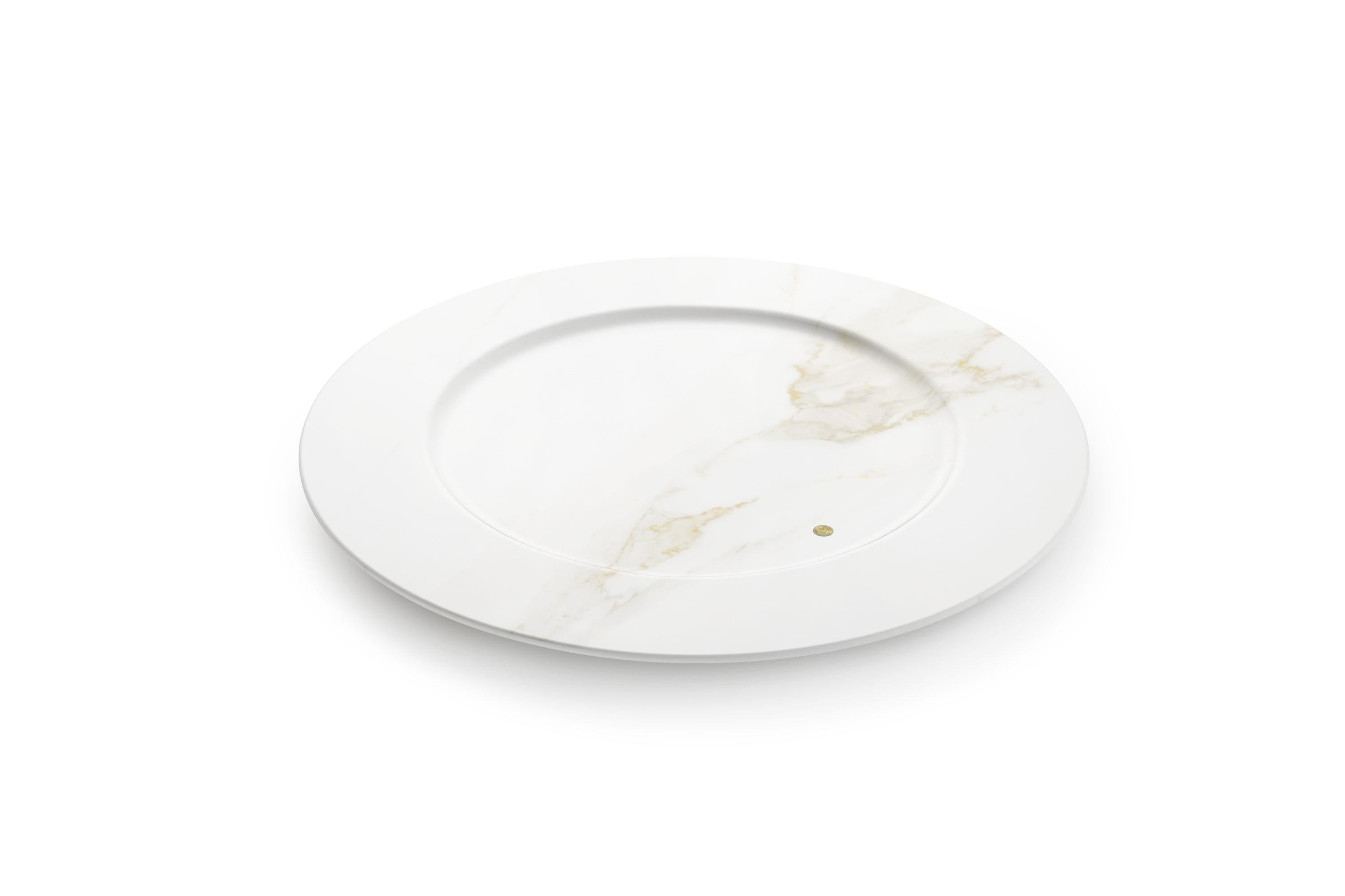 Set of 4 hand carved charger plates from Calacatta marble. Multiple use as charger plates, plates, platters and placers. 

Dimensions: D 33, H 1.9 cm.  Available in different marbles, onyx and quartzite. 

100% Hand made in Italy. 

Marble is a
