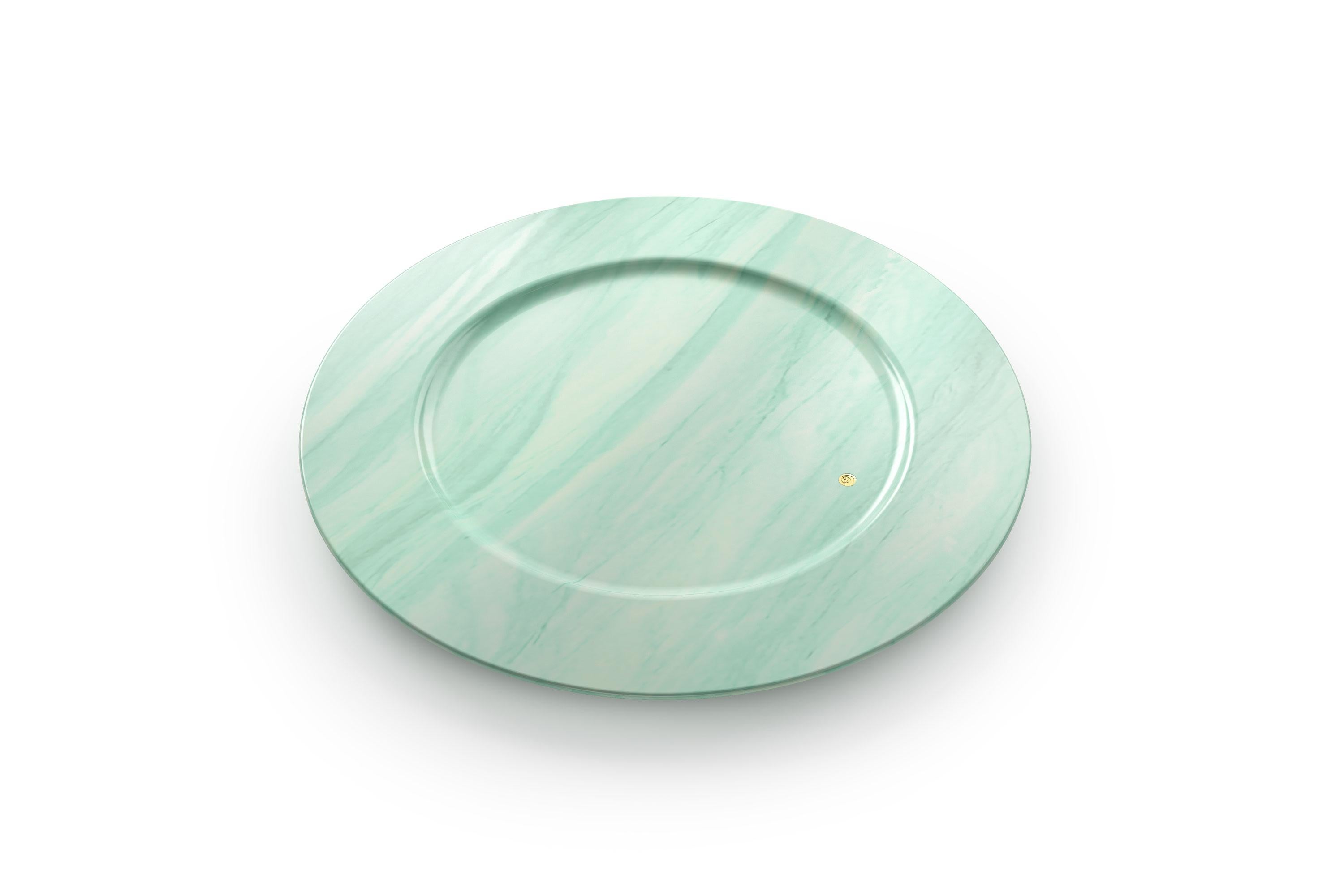 Set of 4 hand carved charger plates from semi-precious green quartzite. Multiple use as charger plates, plates, platters and placers. 

Dimensions: D 33, H 1.9 cm. Available in different marbles, onyx and quartzite.  

100% Hand made in Italy.