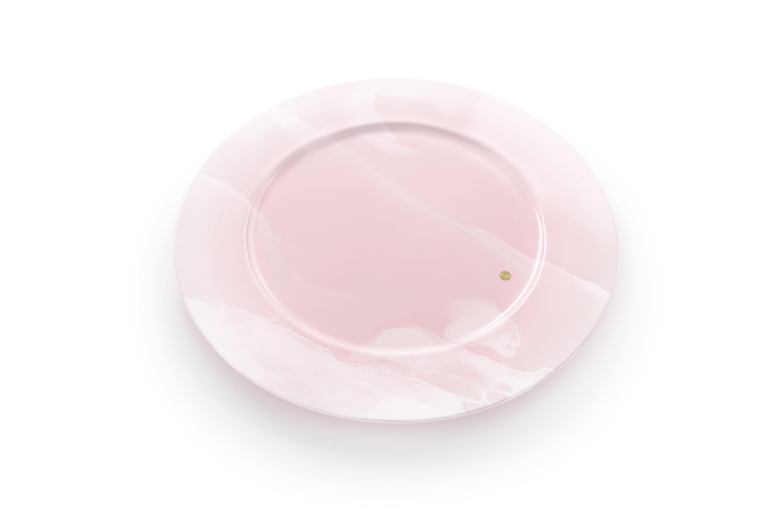 Set of 4 hand carved charger plate from pink onyx. Multiple use as charger plates, plates, platters and placers. The polished finishing underlines the transparency of the onyx making this a very precious object. 

Dimensions: D 33, H 1.9 cm.